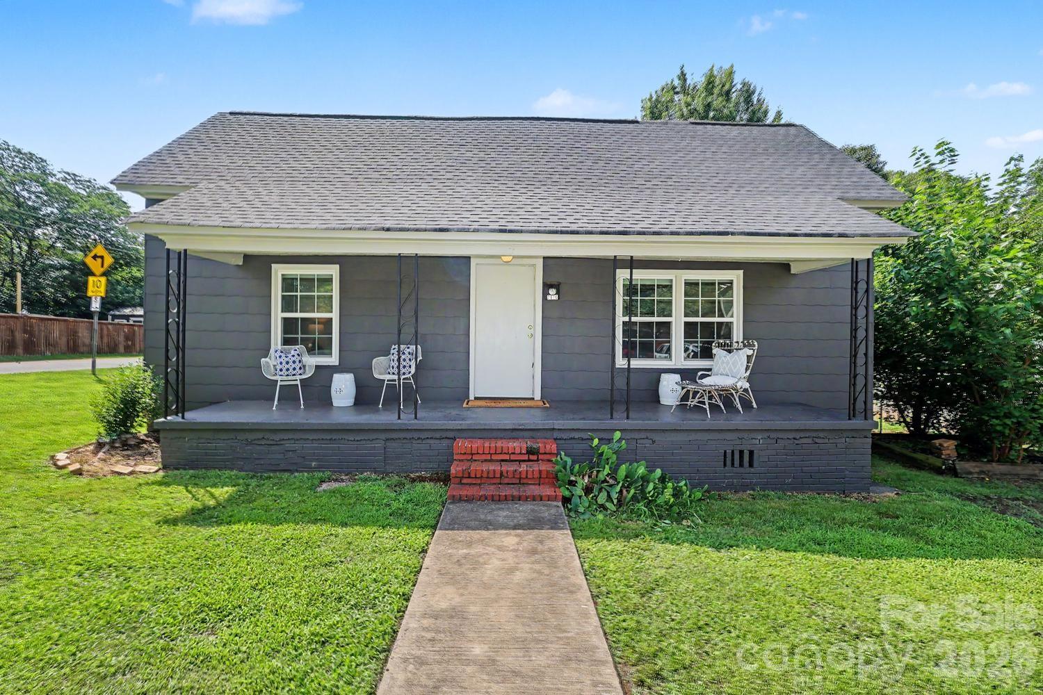 Classic Mill home with an ADU, perfect for serious investor or homeowner, sits on a large corner lot in the heart of the Art's District. Move in ready or create your dream home just the way you want it. High ceilings, heart pine floors, large rooms and primary with en-suite. ADU with Living Room, Kitchen, 1 Bedroom, full Bath, Laundry  + seperate address and driveway; unit has been a yearly rental but would also prosper as an Airbnb/short-term rental. Just steps to the many restaurants,  live music, shops and light rail  that thriving, bustling NoDa is know for. Don't miss out on this unique opportunity in one of Charlotte most  popular, thriving neighborhoods!