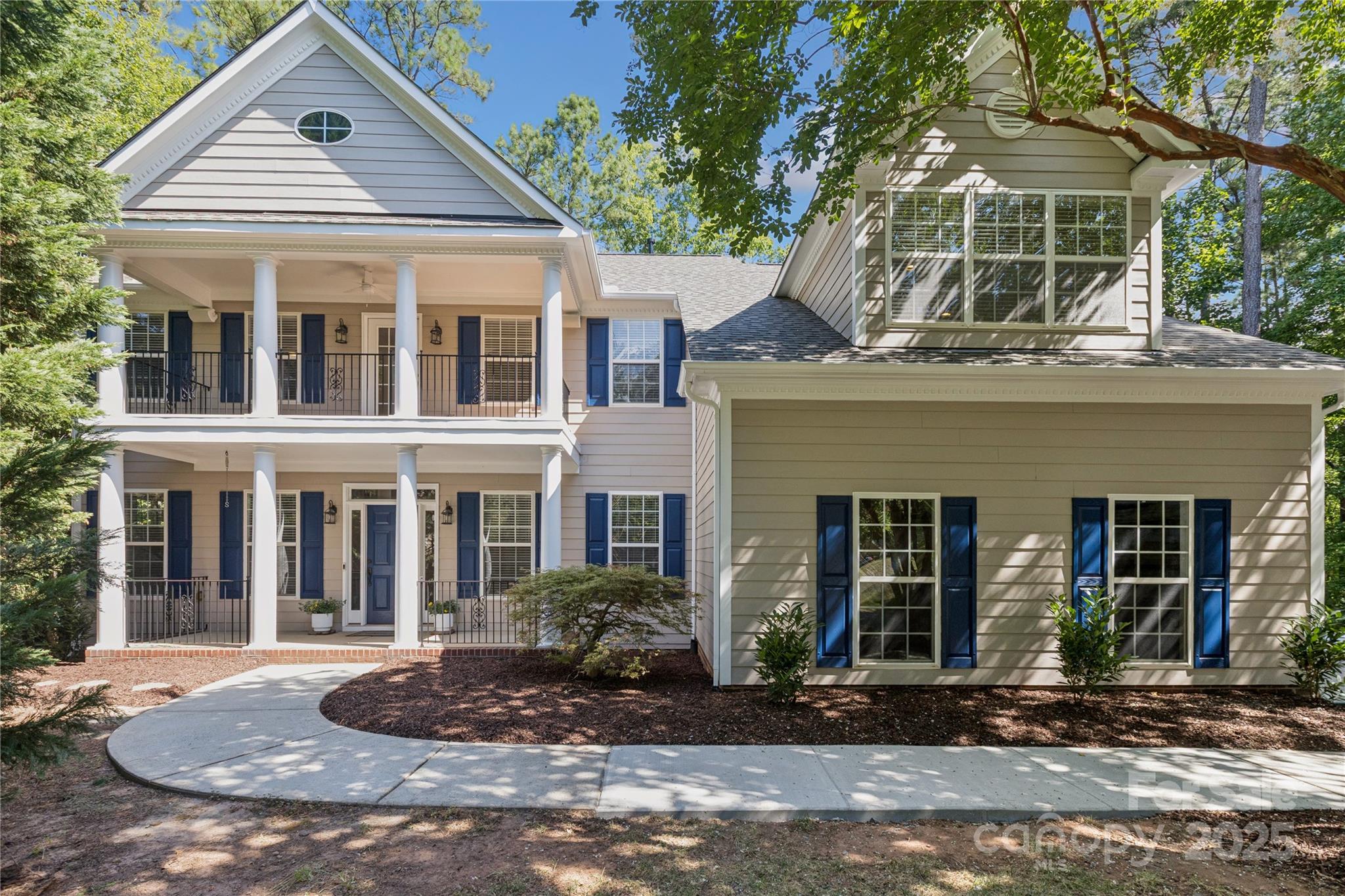 NEW PRICE!! NO HOA!! Ready to reconnect with nature? Located in the highly desirable Tega Cay peninsula, discover this wooded 4-bedroom, 3.5-bath retreat situated on 0.53 acres, offering 3,718 sq. ft. of peaceful living tucked among the trees. The backyard is a blank canvas ready for you to design your own private sanctuary. Whether your dream includes a pool, play area or room for your furry friends, this lot has you covered!

Enjoy outdoor living on the screened deck and upper balcony, complete with ceiling fan and outdoor sound system — perfect for relaxing or entertaining. Inside, you’ll find a first-floor primary suite, a gourmet kitchen with gas cooktop and double ovens, and a two-story great room with a stunning stone fireplace.

This home offers a rare combination of natural beauty & refined living. With a freshly painted interior and exterior (2025), plus a new roof (2025) and newer HVAC (2023), this home is move-in ready and waiting for you to make it your own. PLUS OFFERING $5K BUYER LENDER CREDIT to buy down interest rate or use towards closing costs, when using preferred lender, Allen John, with Guaranteed Rate Affinity (GRA).