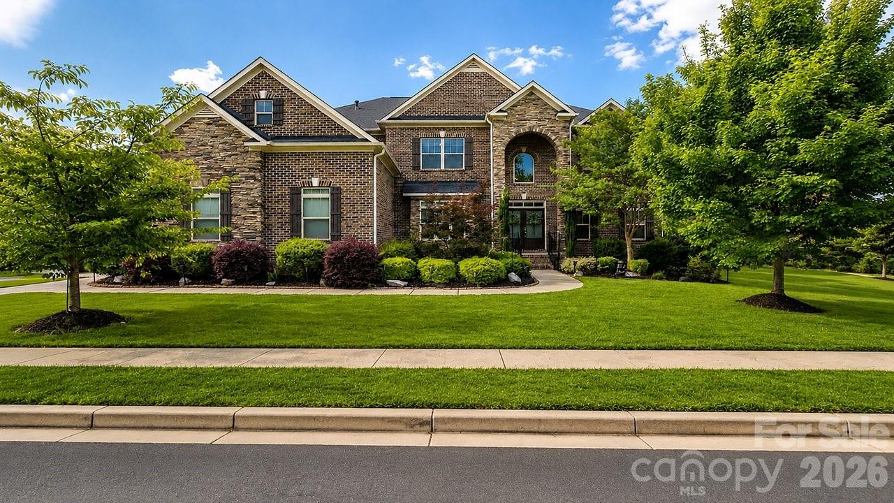 This one will check all the boxes plus more! Location, amenities, space, beauty, functionality, and concessions to personalize the home as your own. Welcome to 16032 Loch Raven Road Huntersville North Carolina. This stunning 6-bedroom, 5.5-bathroom home will capture your attention from the moment you drive up. The warm, rich curb appeal of this corner lot home will make you want to come inside. Once inside, the beauty will draw you to make it your own. You will soon see that no attention to detail was left behind in design and functionality; from the Westinghouse whole home water refiner, kitchen sink reverse osmosis water filter, pot filler, two 50-gallon tank gas water heaters, gourmet kitchen double over, side-mount double garage door that allows for overhead storage or a car lift, and so much more. The sunroom off the massive two-story grand living room is a place of peace and relaxation. The basement level is a finished canvas of opportunity for multigenerational living, a professional home theater, a full-sized personal gym; the possibilities are endless. This beautiful home, full of love, is just a short distance from all that Main Street has to offer.  Schedule your showing today before it’s too late!!
(Home faces 38 degrees NE)