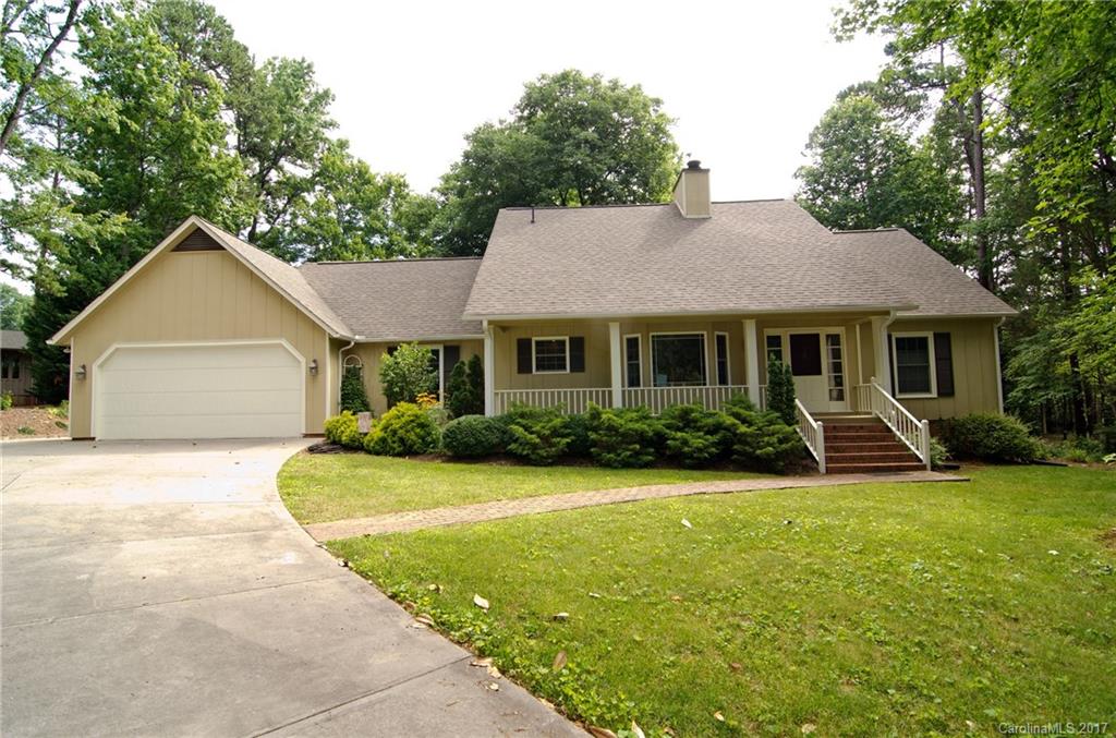 Welcome home!Huge deck overlkg large flat back yard,Rocking chair front porch,Master on main,updated kitchen w/keeping room &fireplace!Oversized bonus room/man cave/teen suite upstairs,lg secondary bedrooms&lots of natural light, tankless hot water heater,new roof 2014,exterior just painted,garage has 220 breaker,extra parking, storage,lg work area.Award winning Clover School District! Located in gated community w/24 hour security,walking trails,lakefront park,marina,country club w/golf &swim.