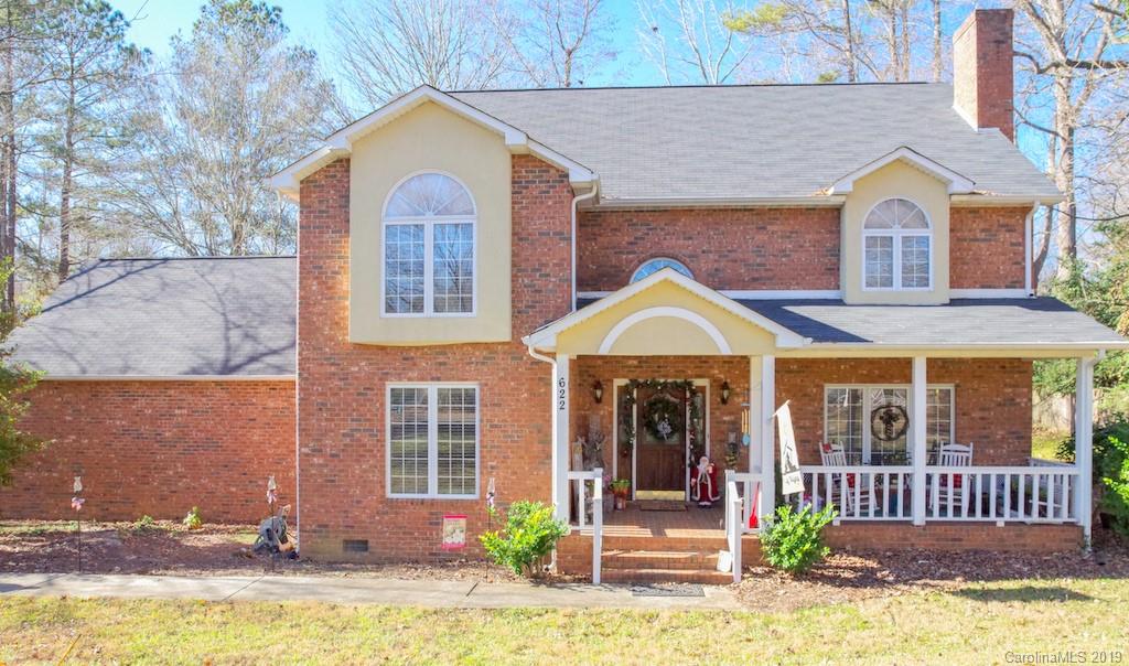 This 4 bedroom 3 bath home is located on a mature wooded corner lot with rounded driveway.Located close to shopping,restaurants and downtown Lancaster.The main level features a spacious family room with wood burning fireplace that is open to the formal dinning,a sizeable ktichen with eat-in area,a separate den,Laundry/mud area,a generous guest bedroom and full bath.As you enter the front door, you're greeted with a beautiful foyer with hardwood floors and grand staircase to the upstairs.Upstairs you'll find the large master suite with his and hers walk-in closets,double vanities,large tub and separate shower.The other 2 bedrooms are also roomy and share a Jack and Jill bath with double vanity and secluded toilet/shower room.The garage allows for ample parking and also offers a spacious storage room.This home has character,desirable layout,location,all brick,side load garage,large deck,corner lot,no HOA and many more positive elements.