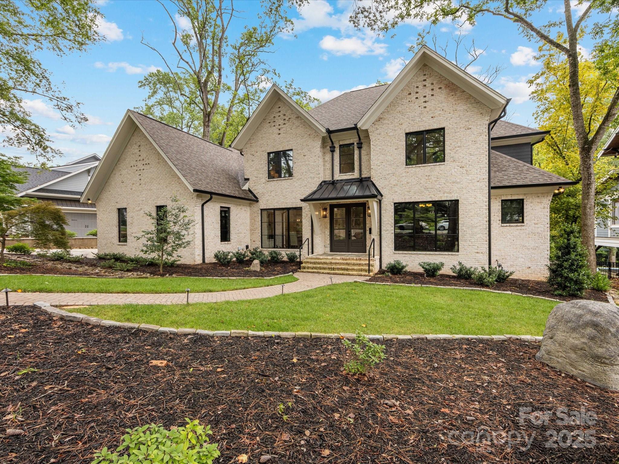 2024 BEAUTIFUL Custom built home on a tranquil tree-lined street in Cotswold. Home adorned with high end, luxury finishes and appliances throughout. Gorgeous curb appeal! Chefs kitchen with large quartz island, Thermadore appliances, 48" gas range with double ovens, large walk in pantry with sink, separate scullery with built in cabinetry. Sellers recently installed a hidden door with access from the Dining Room to the Scullery. Family Room & Breakfast Room open to a covered bluestone porch w/ infrared heaters, gas fireplace, tv, fans, in-ground gas grill and beverage fridge. Huge back yard with over a half acre to enjoy or build a pool. Exquisite Primary En Suite on the main floor with vaulted ceilings overlooking private fenced yard. Primary custom closet and bathroom with large walk in shower and free standing tub. Laundry on main and upper floors. Upstairs is 4 bedrooms all en suite and a large Bonus room perfect for Movies, Gym Equipment or used as a Playroom. 3 Car Garage.