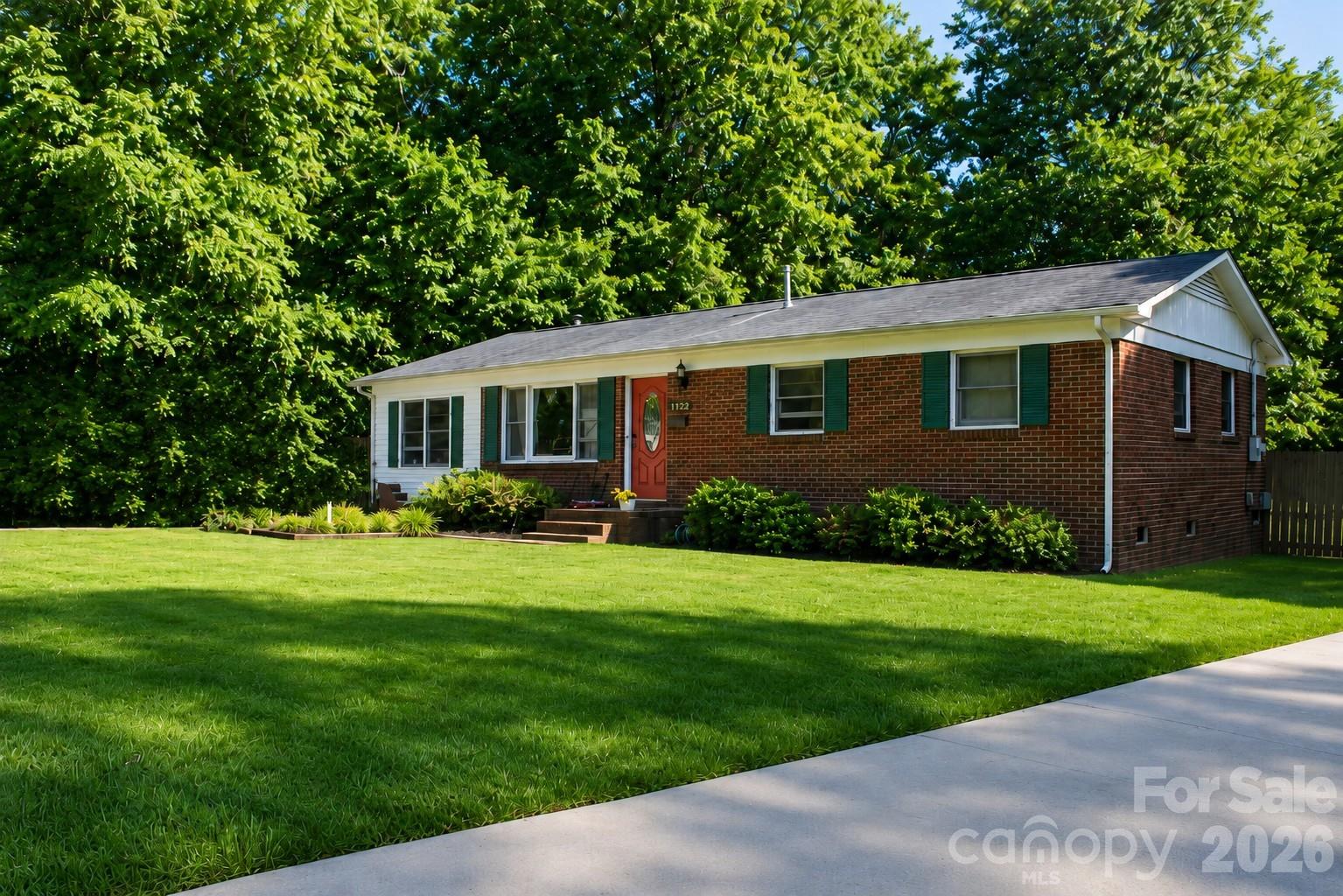 An exceptional opportunity to build, reimagine, or invest in one of Charlotte’s most coveted and fast-appreciating neighborhoods. Privately positioned on a quiet cul-de-sac in the highly desirable Clawson Village/Sedgefield area, this 3-bedroom, 2.5-bath residence rests on a perfectly flat 9,583-square-foot lot with no easements, creating outstanding potential for a luxury renovation, expansion, or custom new construction.

A standout feature of the property is its private backyard retreat, enveloped by mature trees and natural wooded privacy. This serene setting offers a rare sense of seclusion, filled with birdsong and peaceful surroundings, while remaining moments from Charlotte’s premier destinations.

Built in 1971, the home provides a strong foundation for redevelopment or renovation. City water and sewer are already in place, and the property is surrounded by newer construction and luxury residences, with multiple new builds established on the street.

Ideally situated just minutes from South End, Freedom Park, Dilworth, Park Road Shopping Center, and Uptown, 1122 Zion Court delivers an unmatched blend of privacy, prestige, convenience, and long-term investment potential in one of Charlotte’s most sought-after locations.

Showings by appointment only through ShowingTime. Please do not disturb residents.