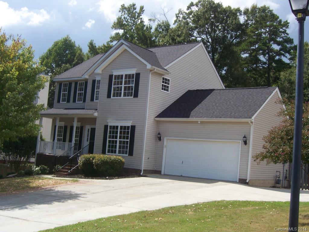 Located on a large lot backing up to woods, this wonderful home is ready to move in! New paint, carpet, hardwoood flrs, appliances, etc. Downstairs finished basement has a big family room/bonus w/ fireplace, bath, kitchenette, & the 5th Bedroom.