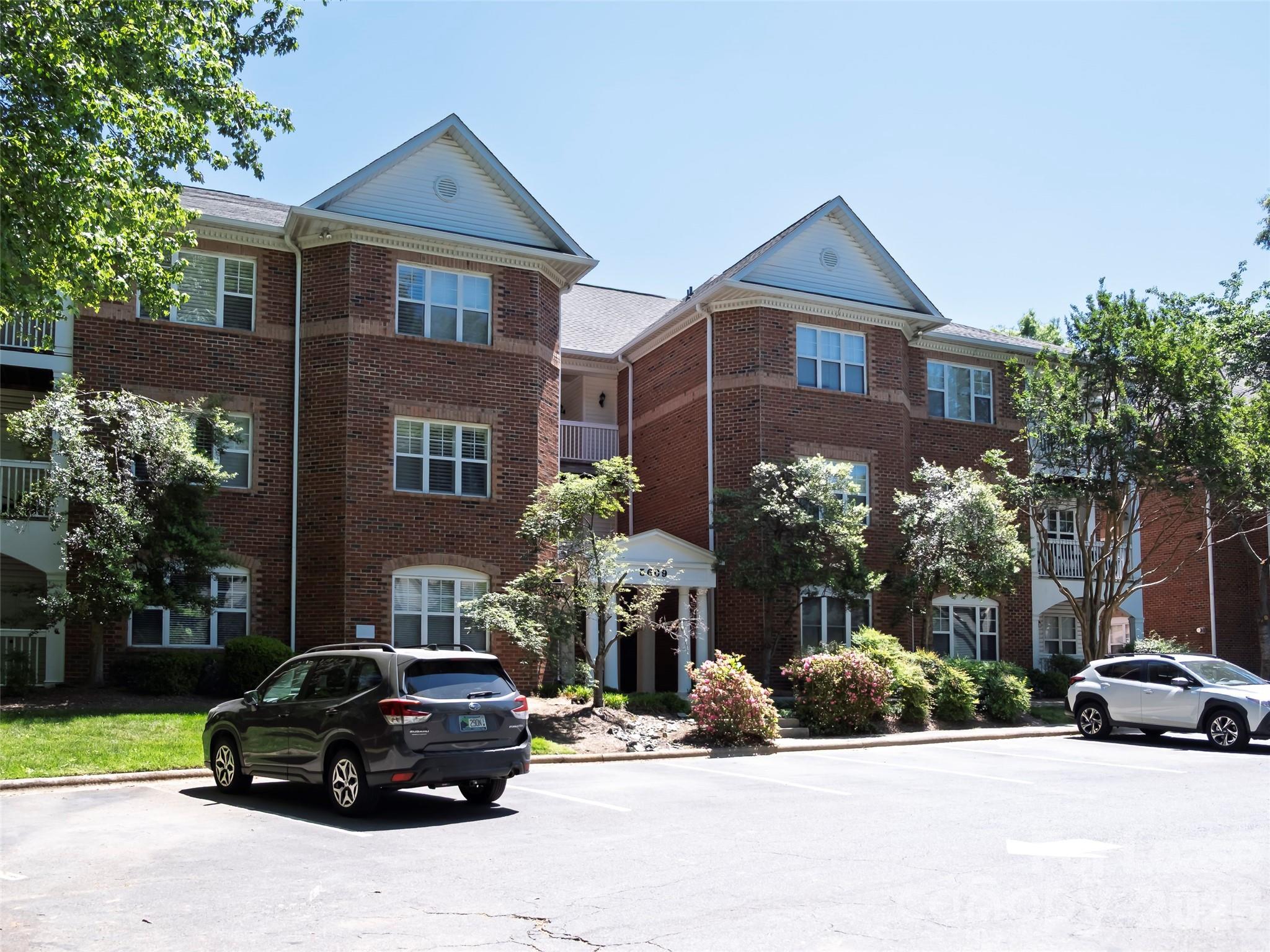 Wonderful Ground Floor Unit With Complete Privacy.  This Spacious Unit Features Plenty of New Cabinets in the Kitchen Outfitted with Quartz Countertops & Gas Range.  The Huge Living Room Features a Lovely Fireplace You'll Enjoy 8 Months/year.   The Dining Area is Splendid and Overlooks the Living Area & Fireplace.  Large Bedrooms with Walk-in Closets Complete with Fabulous Floor Plan.  The Bathrooms Feature New Cabinets w/Quartz Countertops.  Don't Miss the Side Porch that is Covered & Fenced.
