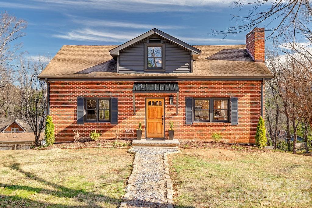 This is the home you’ve been waiting for in the desirable Haw Creek area — a fully reimagined, move-in-ready retreat that checks all the boxes. Thoughtfully remodeled from top to bottom, this spacious home offers four bedrooms and 2.5 bathrooms. On the main level, what was once two bedrooms, has been converted into a relaxing primary suite for winding down with a walk-in closet, a large spa-inspired bathroom with double vanity, a custom tile shower with gold rain head plumbing fixtures, and even its own in-suite laundry option for ultimate convenience.

The main living space flows seamlessly for entertaining, with a bright living room and dining room opening into the brand-new kitchen. Designed with both style and function in mind, the kitchen features oak cabinetry, Calacatta quartz slab countertops that wrap up the backsplash, and a full suite of General Electric White Café appliances — including a 5 burner range, double drawer dishwasher, a French-door smart refrigerator with hot and cold water dispenser, and microwave with air fryer feature.

This home’s improvements go far beyond the cosmetic. A new electric heat pump with triple-zone climate control, upgraded electrical service, almost all new plumbing and plumbing fixtures, new lighting, and freshly refinished hardwood floors. Step outside to enjoy the newly built deck, or spend time in the flat, usable front yard — perfect for play, neighborhood hangouts, and easy connection with friends.

The basement offers newly added finished space, thoughtfully designed for entertainment — complete with a projector plug-in for movie nights or game days. A one-car garage with a new garage door, a second laundry area, and stylish updates throughout add to the home’s convenience and flexibility.

Beautifully updated, centrally located, and designed for everyday comfort and connection, this Haw Creek gem is truly a rare find. Don’t miss your chance to make it yours in 2026.