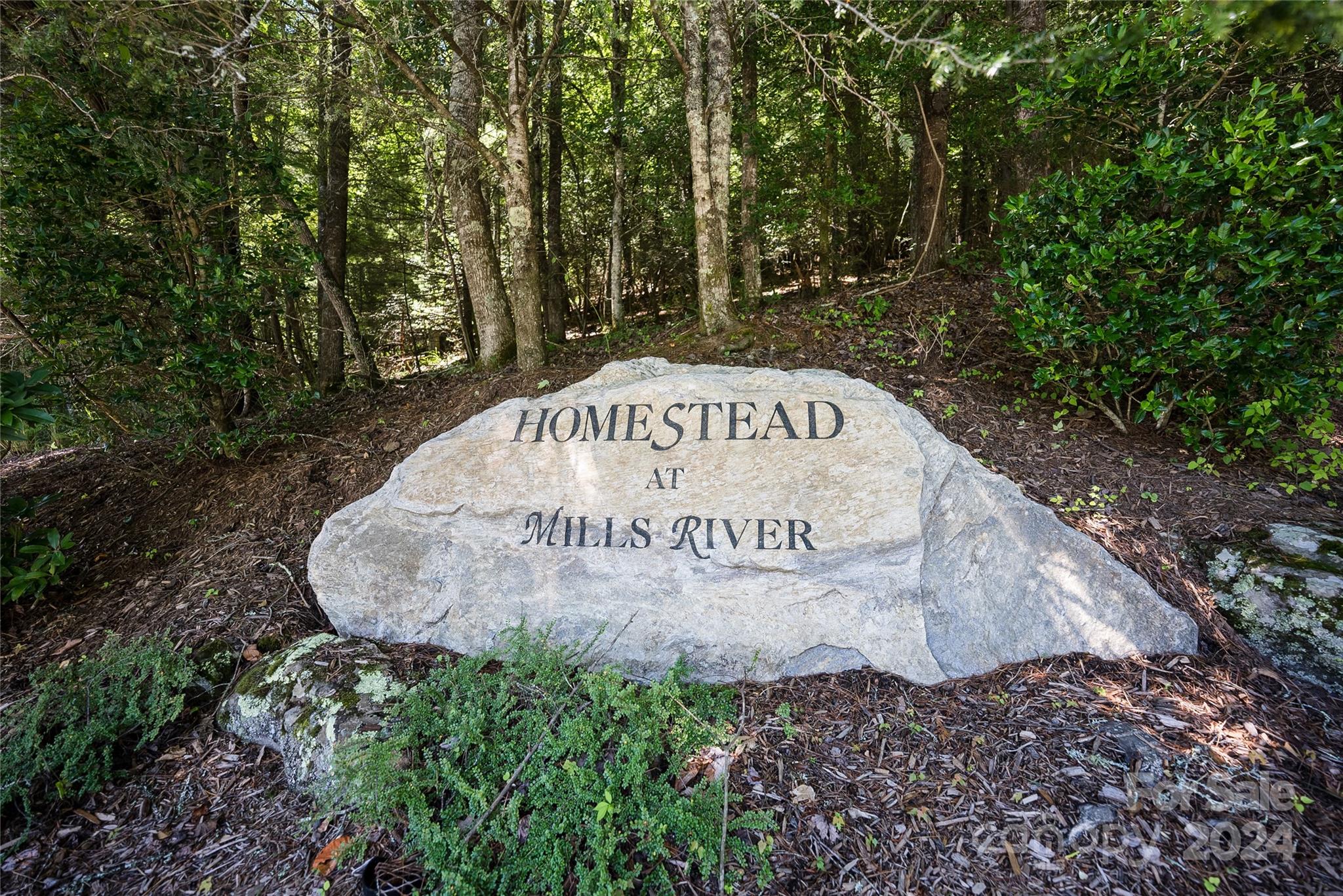 Large 1.6 acre lot in the heart of Mills River in desirable Homestead at Mills River. Incredible view potential and just 1 mile from gated entrance. 
This private gated community is a hidden gem with easy access to both Asheville and Hendersonville. Rhododendron and Mountain Laurel galore. Paved roads with beautiful wooded areas along the way. Underground utilities and natural gas are available. Club house is remote on 10+ acres along the riverfront. The Mills River area offers some of the finest trout streams, camping, hiking, and mountain biking in the WNC area—15 easy minutes to the Asheville Airport. Owners here have access to a 10 acre riverfront park and Club House at the Homestead River Reserve on the Mills River - a fly fishing playground!