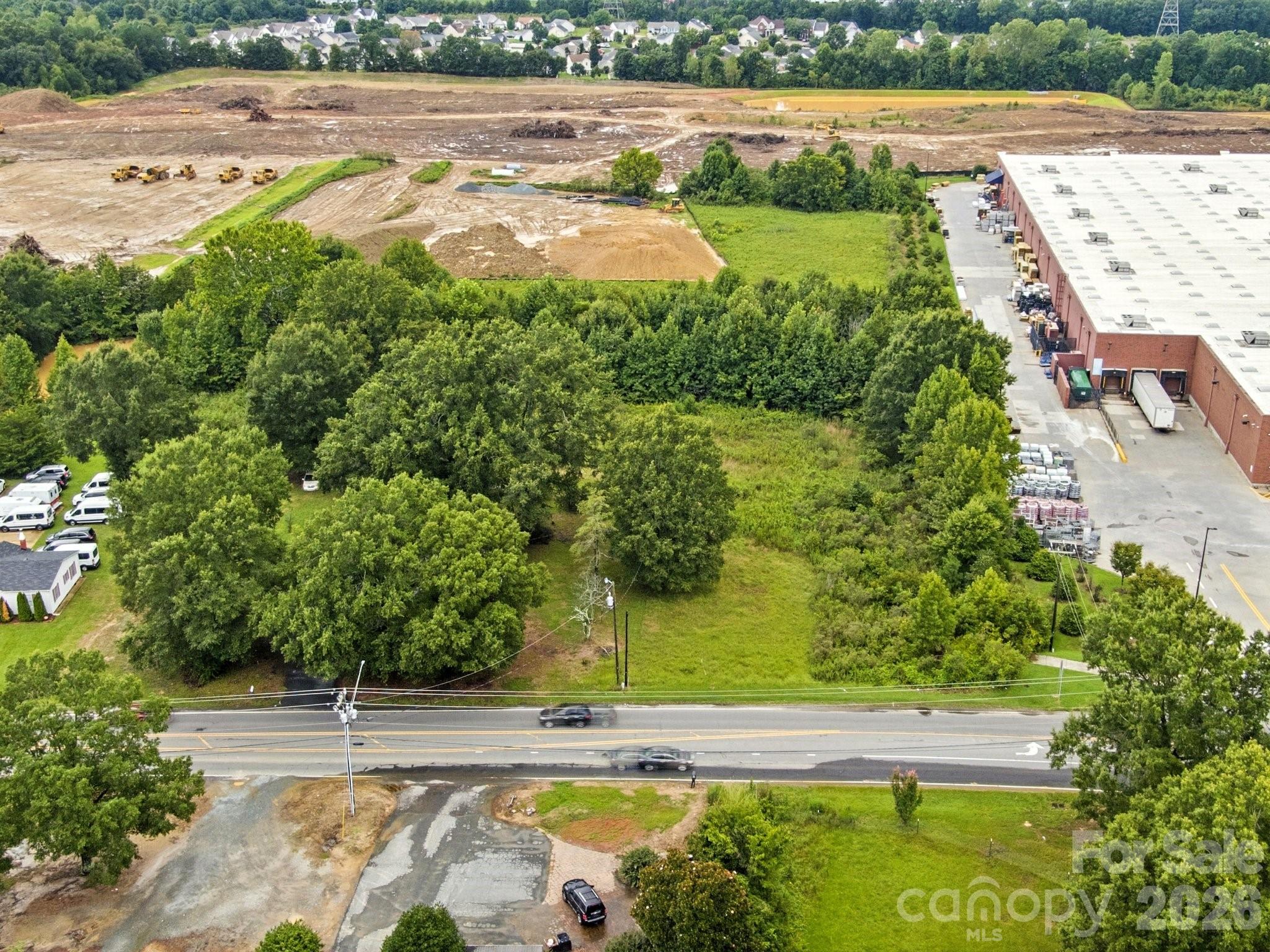Prime Development Opportunity in Indian Trail, NC

Introducing a remarkable investment opportunity at 3619 Wesley Chapel Stouts Rd, situated adjacent to an exciting 62-acre development project that is set to redefine the local community landscape.

What’s Coming:
- A modern hotel catering to travelers and visitors
- A senior living facility providing quality care and community
- 94 upscale townhomes designed for families and professionals
- Apartment complexes offering comfortable living options
- Versatile office spaces for businesses
- Four retail outlets, bringing vibrant shopping and dining experiences to the area!

The planned infrastructure signal the area’s significant investment and potential for future growth. Permittable uses attached which include Pharmacy, Banks, medical offices, restaurant with drive thru, gas station, funeral home, car wash, post office, and many more options ! Call today and make an appointment. Home on property is of no value.