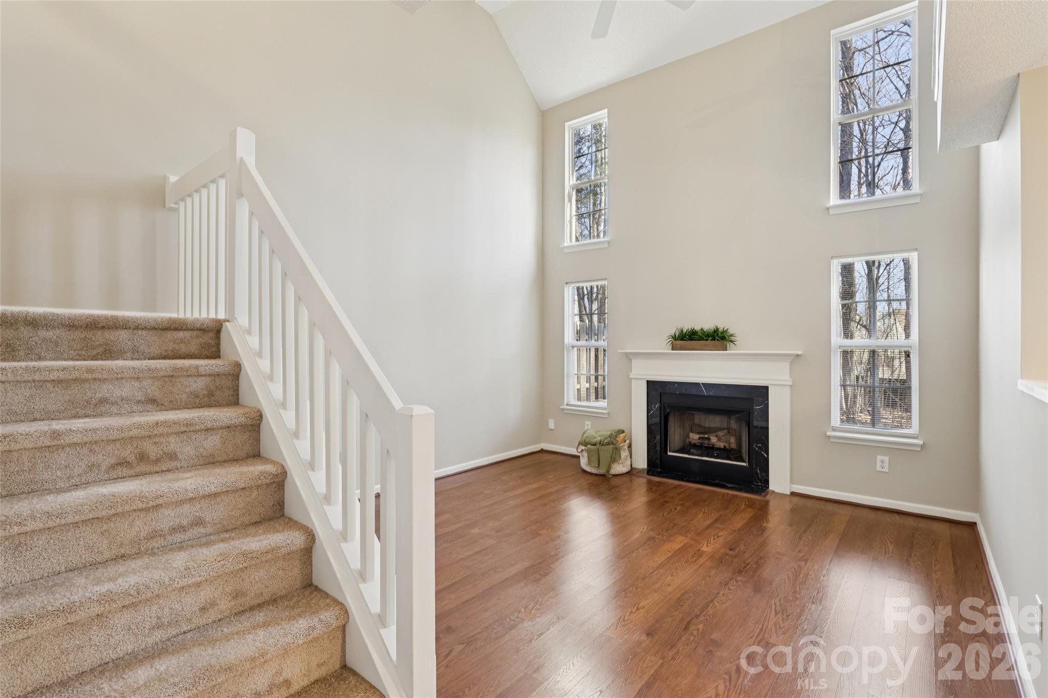 Exceptional value thanks to the versatile loft! One of the largest two-bedroom townhome floor plans in University Heights, offering 1,696 square feet of living space—much larger than many competing townhomes in this price range. 

The standout feature of this home is the spacious second-floor loft, providing flexible space for a private home office, media room, workout studio, or second living area. The open concept flows effortlessly into a two-story great room flooded with natural light and featuring a cozy gas fireplace. Just past the fully equipped kitchen, you will find your own private paver patio, which serves as the perfect peaceful retreat for morning coffee, evening grilling, and entertaining friends.

Upstairs, the primary suite offers a walk-in closet and private bath, complemented by a second bedroom and full bath. An attached garage adds everyday convenience.

With one of the community’s largest floor plans, fresh paint throughout, brand-new carpet upstairs, and an improved price, this move-in-ready home offers outstanding space, flexibility, and value.

Enjoy low-maintenance living with HOA services that include exterior maintenance, lawn care, water, sewer, trash service, and access to the community pool. Conveniently located near UNC Charlotte, I-485, shopping, restaurants, and uptown.

Ask your Realtor about available lender programs, including down payment assistance and select 100% financing options for qualified buyers.