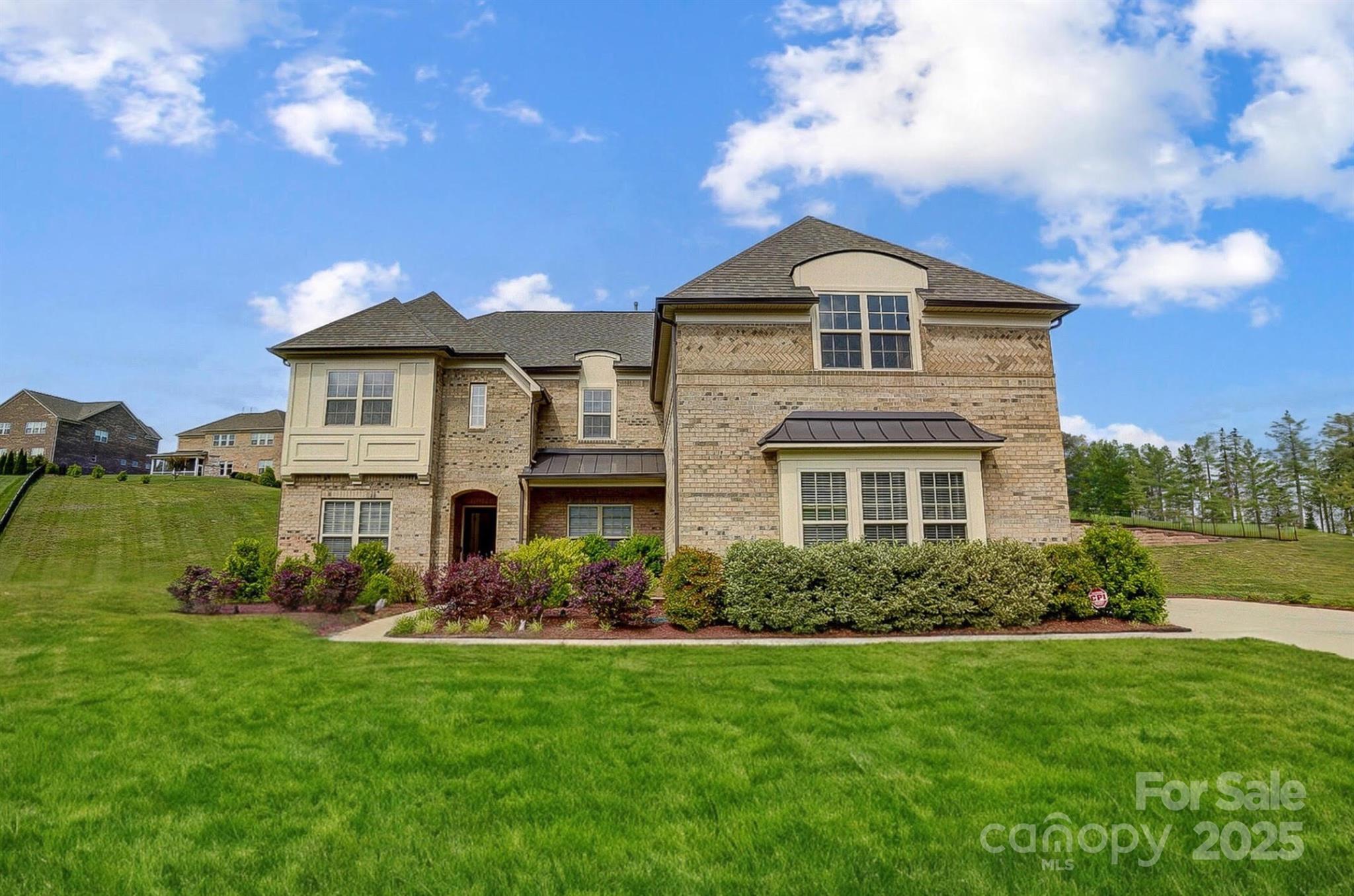 AMAZING NEW PRICE! FULL BRICK, 3 Car Garage, Built in (2020), Huge .75 Acre end of cul-de-sac lot! Beautiful open floor plan in popular Bridgemill swin club community. Expansive layout featuring dramatic 2-story foyer, spacious Great Room w/coffered ceiling & stacked stone gas fireplace, and abundant hardwood flooring. The main floor includes a home office, private guest suite, and a stunning gourmet Kitchen with a large island, SS appliances, butler's pantry & walk-in pantry. Additional main floor features include a Drop Zone, separate computer niche/2nd office, Dining area, Sunroom, & large Laundry room. Upstairs, find a large Bonus room, luxurious Primary suite with sitting room & spa bathroom, 3 additional bedrooms each with private bathrooms, and walk-in attic storage. Enjoy Bridgemill's incredible amenities including 2 resort-style pools, tennis courts, clubhouse, and fitness center. Exceptional property in immaculate condition! Backyard Pool rendering not included in List price.