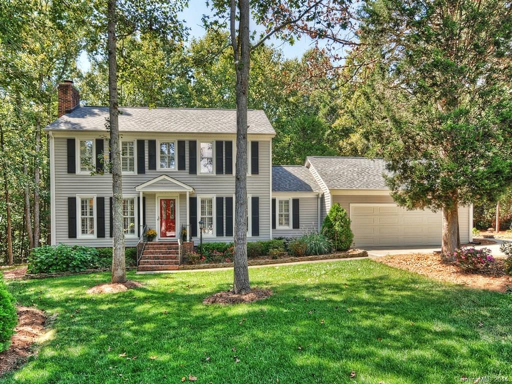 Amazing upgraded home in Carowoods. Lots of hardwood floors. Formal DR, upgraded KIT w/gas range & granite, in  BAs too. Spacious master BR w/upgraded BA. Plantation shutters & crown molding thru-out the home. Brick gas fireplace in GR. Inviting sunroom. Lg deck w/awning. This home sits on over an acre in a well established neighborhood w/no HOA. Irrigation system in the front. Extra storage in the garage. New roof & windows in '12, siding in '02, tankless water heater, & HVAC in '09.