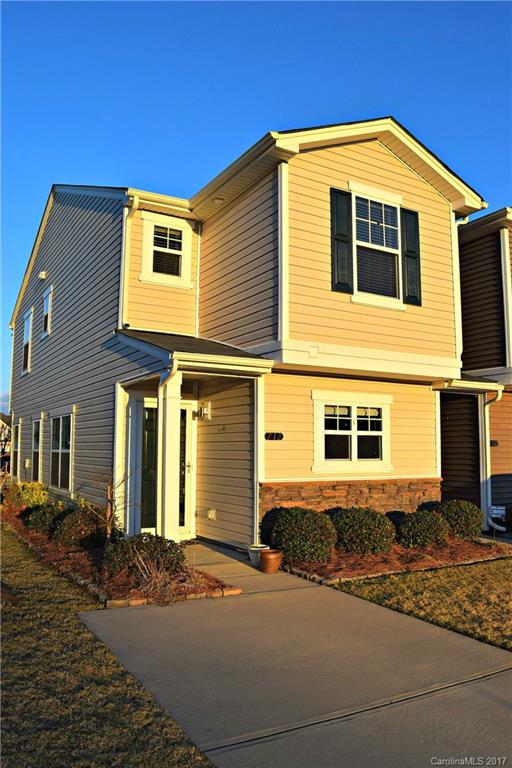 Phenomenal end unit in desirable Catawba Village.  Premium lot just steps away from the pool! Interior is outfitted with granite counter tops, ceramic tile and hardwood floors, upgraded cabinetry and fresh paint and carpeting.  Dual master bedrooms upstairs make for excellent privacy.  Don't miss out o the proper-tunity!