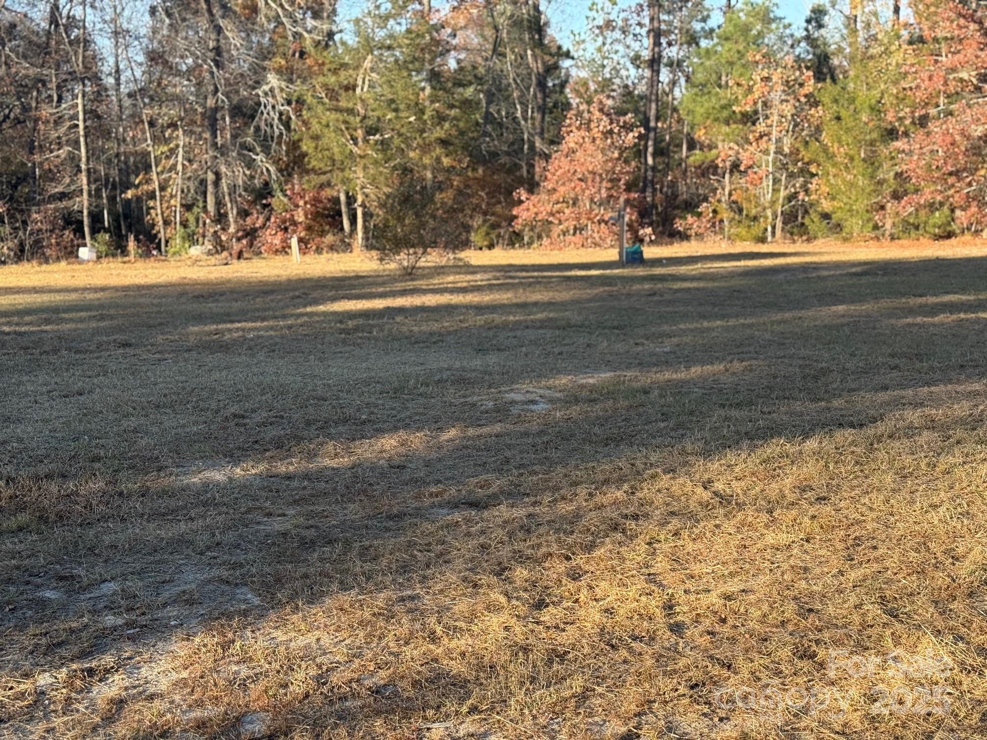 This 1 acre lot is approx. 1 mile out of the town limits of Kershaw, Its cleared & ready for a home to be placed on it.  It has county water/septic & Power already in place.  It's back off the road for privacy  ONE ACRE is hard to find!  Let this LOT BE YOURS!