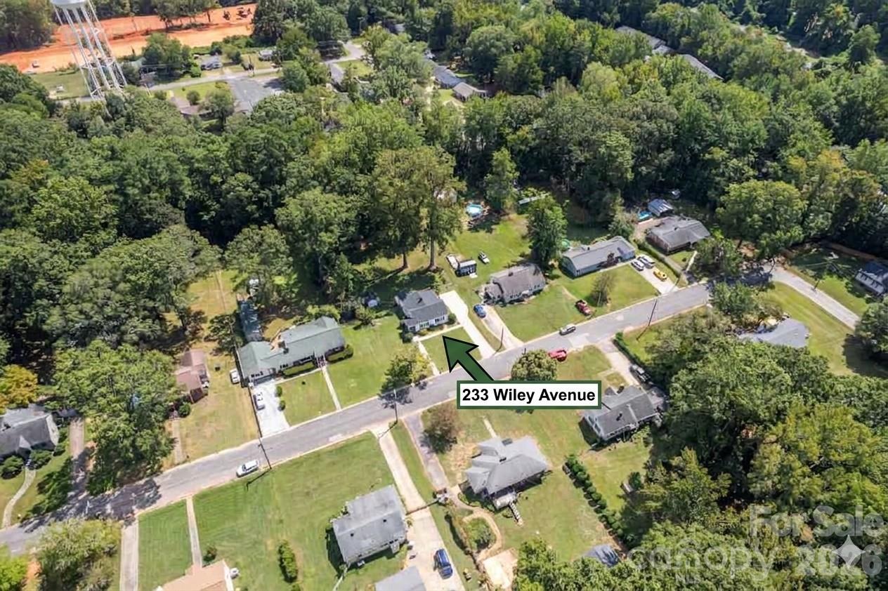 If you are looking for a classic home that has charm and character but has been completely updated, we have the house for you! Within the last 3 years this cute as a button home has gotten a new roof, new siding, new gutters WITH leaf filters, new windows, refinshed hardwood floors, freshly paved driveway with 4.5 foot extension, new 2.5 ton heat pump HVAC, completely new plumbing completed by Morris Jenkins, new concrete patio, updated bedroom closets, pantry and NEW laundry closet...and that's just what's NEW! 
Walking in you are greeted by a large, light filled family room that flows into your open kitchen with a good amount of (new) cabinets and counter space.  Off the kitchen is your new laundry closet and cozy eat-in kitchen area, perfect for a morning room, dining space or additional sitting space.  Downstairs also features two full bedrooms and a full bath.  Ourside is a large, level fenced is backyard with 12x20 deck with direct access stairs that go to your backyard and new concrete patio.
Flex space/ loft upstairs can be a guest overnight space or kids play area due to height restrictions and includes a half bath.  Think of it as finished bonus space!
Close to downtown York and on one of the prettiest streets in York, you don't want to miss this one!