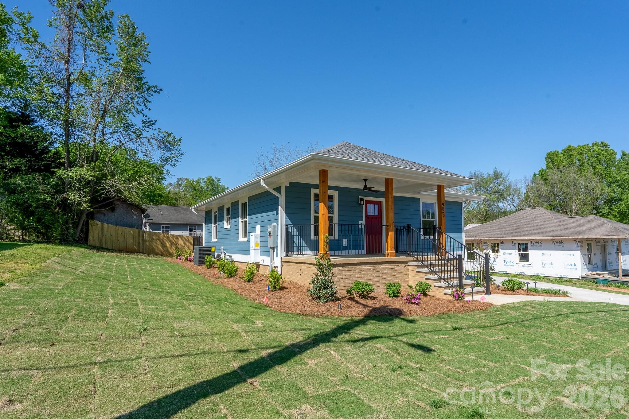 USDA-approved property offering $15K grant for closing/down payment (CC Mortgage eligible). This meticulously restored craftsman home located in Fort Mill's vibrant downtown—steps from breweries, eateries, and the Comporium Amphitheater's park trails. Inside: original charm meets contemporary edge—granite counters, gleaming hardwoods, smart home tech (Ring security with 24/7 surveillance, motion sensors, alarms). Chef's kitchen features Wi-Fi-enabled GE Profile stainless steel suite. Extras: HUGE multiple areas in attic for storage, tankless water heater, professional landscaping (self-watering Zoysia lawn), automated exterior lighting. Luxury that works as hard as you do.