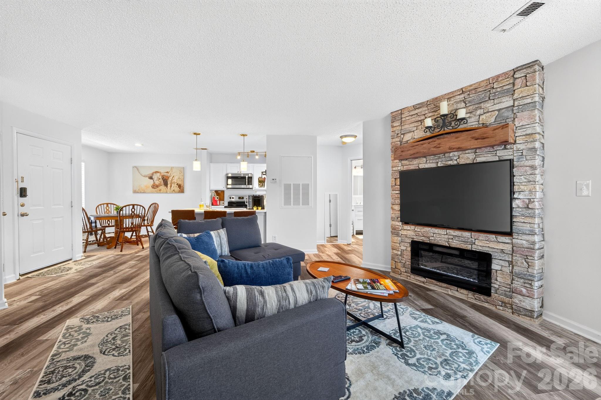 Welcome to this beautifully updated 1-bedroom condo offering a rare turnkey opportunity for investors or anyone looking for low-maintenance living. This unit comes fully furnished as seen in the photos—everything you see stays—making it ready for immediate use or continued operation as a short-term rental. Currently operated as a short-term rental since 2022, the condo has a strong rental history. Thoughtfully updated in 2021, the home features fresh interior paint, vinyl plank flooring, stainless steel appliances, and quartz countertops in the kitchen. The HVAC was replaced in 2021, and the water heater is from 2019, and the unit includes a transferable American Home Shield Gold Plan home warranty through March 2027, providing added peace of mind for the next owner. Washer and dryer remain as well. Enjoy a covered patio overlooking the pool, plus access to community amenities, including a pool, clubhouse with kitchen, ping pong table, fitness center, and business/office center. Whether you’re looking to expand your rental portfolio or secure a low-maintenance getaway, this fully furnished condo is ready from day one.