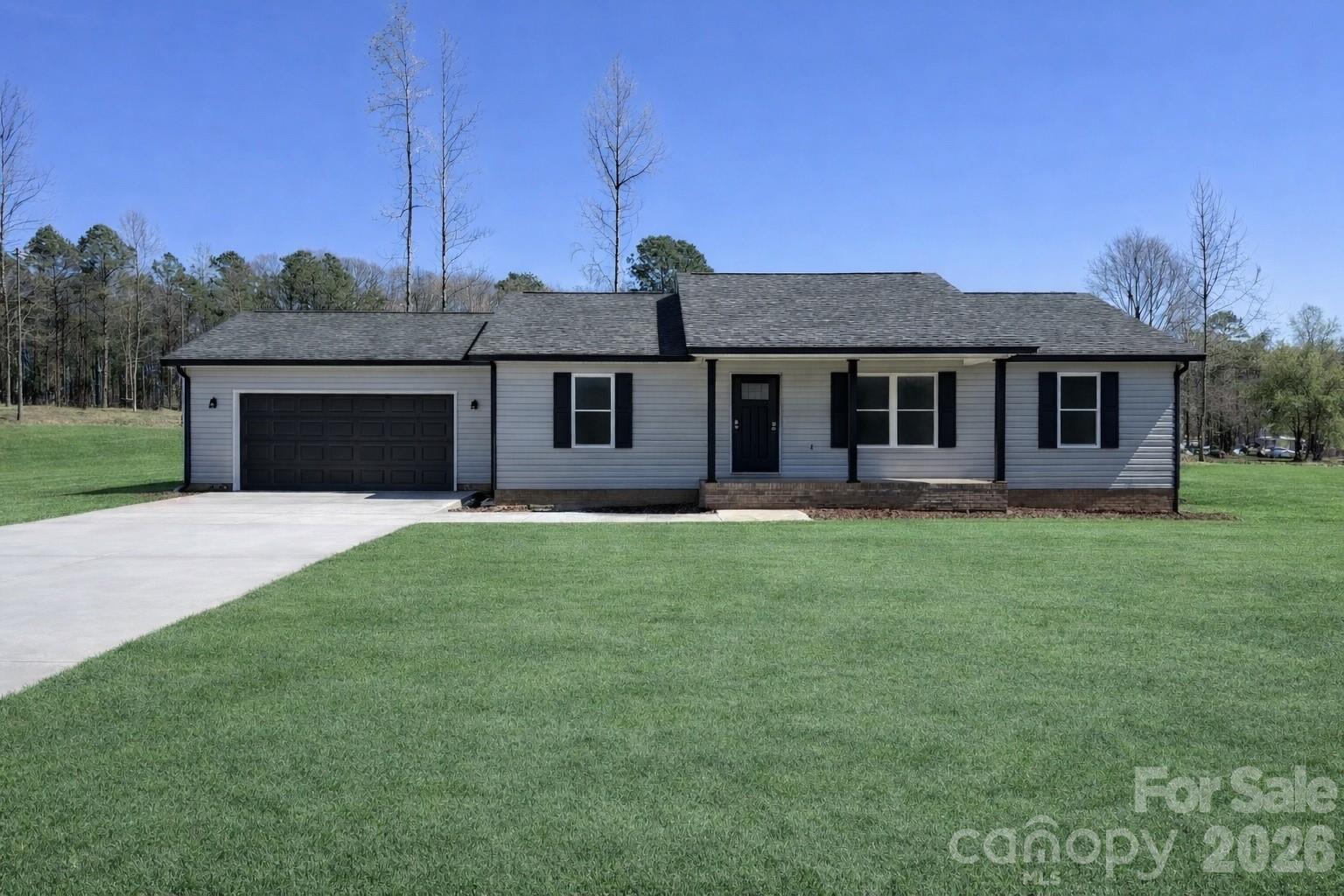 Don’t miss out on this beautiful new construction—progress is moving quickly and this home is coming together beautifully. Located in a quiet, established neighborhood with convenient access to shopping, dining, and entertainment. This three-bedroom, two-bath home features an open floor plan, vaulted ceilings in both the living room and primary bedroom, and a dedicated laundry/mudroom offering easy access from the garage. A perfect blend of comfort, style, and convenience. Schedule your showing today! The second picture is AI generated for the grass. The yard will be seeded. Seller will pay up to $5,000 in closing.