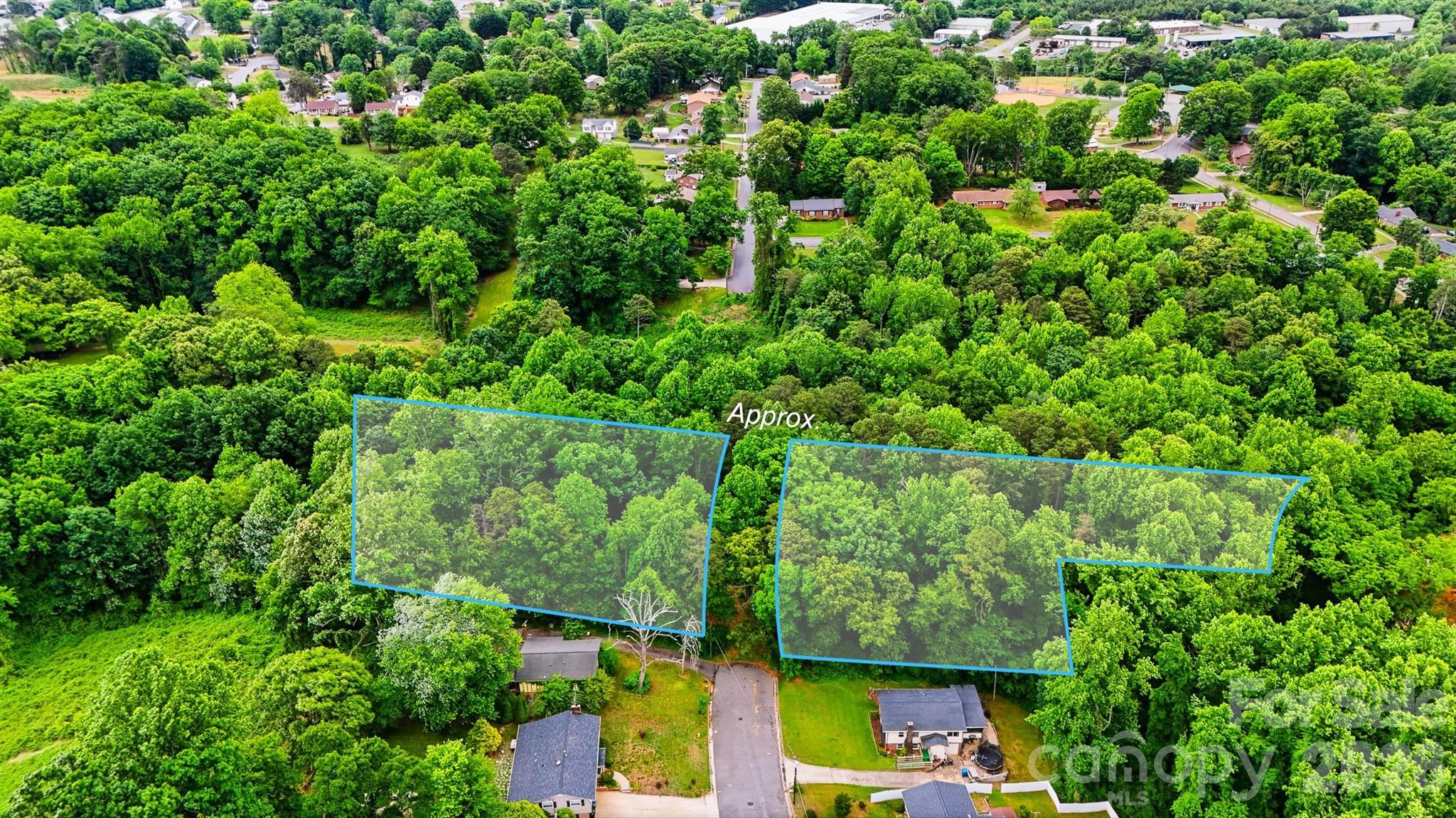 More than 2 acres of land in city limits ready to be developed! Within walking distance to downtown, City Walk, Ridgeview Walk, University Walk! Zoned R-4, these two parcels can accommodate single family, small lot single family, multi-family, and duplexes. See City of Hickory Website (www.hickorync.gov/zoning-districts) for more info on permitted uses and set back measurements. Water and sewer fees have NOT been paid. According to the City of Hickory, 3/4" water is $3,236 per home/unit and sewer is $2,465 per home/unit. Back portion of lot is in a flood zone.