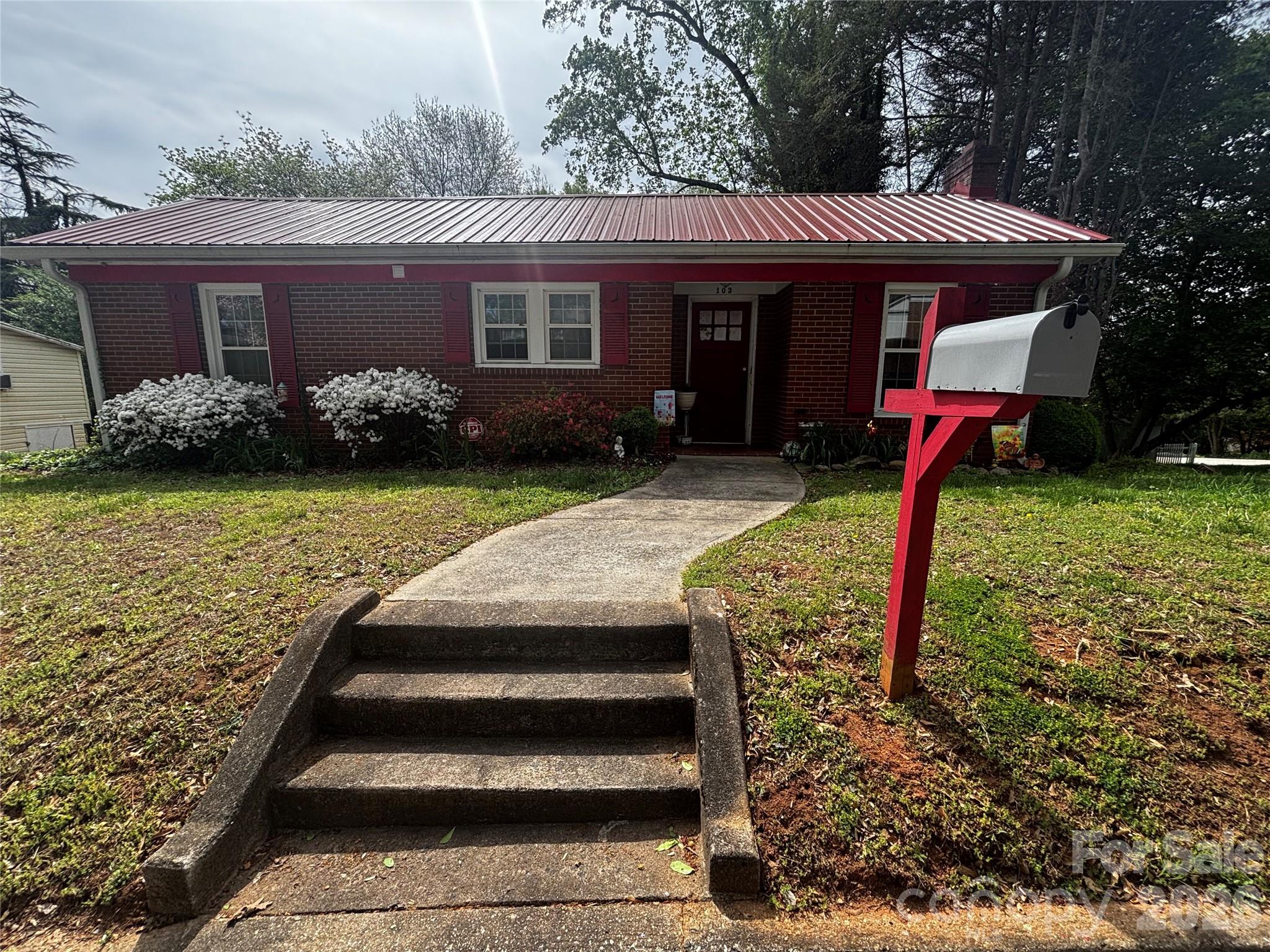 Enjoy the convenience of in-town living in this charming home nestled in an established neighborhood just minutes from parks, restaurants, shopping, and everyday amenities. This inviting home features 2 bedrooms, 1 full bath, a cozy living room with a fireplace, a vintage-inspired kitchen, and a bright dining area. A shared driveway leads to a private parking area behind the home near the basement entrance. The cellar-style basement offers additional storage space, while the private fenced backyard provides room to relax, garden, or entertain. Whether you're a first-time homebuyer, looking to downsize, or searching for a great investment opportunity, this property offers plenty of potential in a desirable location. Schedule your showing today!