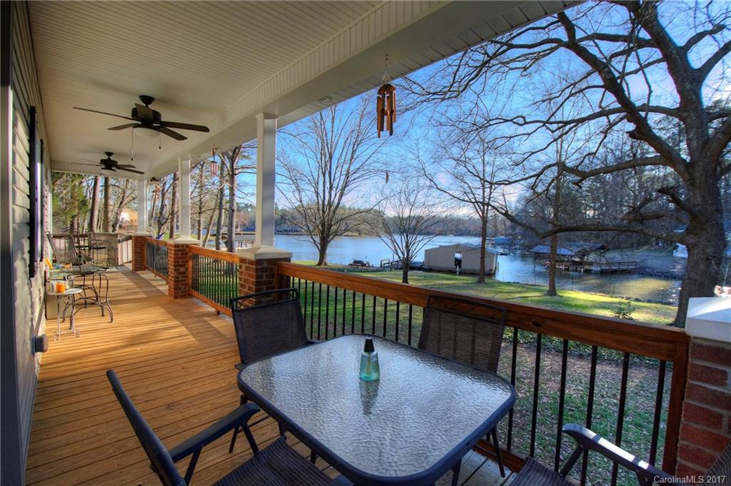 Waterfront home in fantastic location! Recently remodeled  and updated, ready for you to move in & enjoy living on Lake Wylie. Two master suites on the main level, plus two bedrms and bonus upstairs. Beautiful hardwood floors, gorgeous kitchen with custom cabinets and large island for eating and serving. You'll love relaxing in the sunroom overlooking the lake. Chill out in the swimming pool on hot summer days. Super level lot & boathouse for easy access to the water. Excellent Clover schools.
