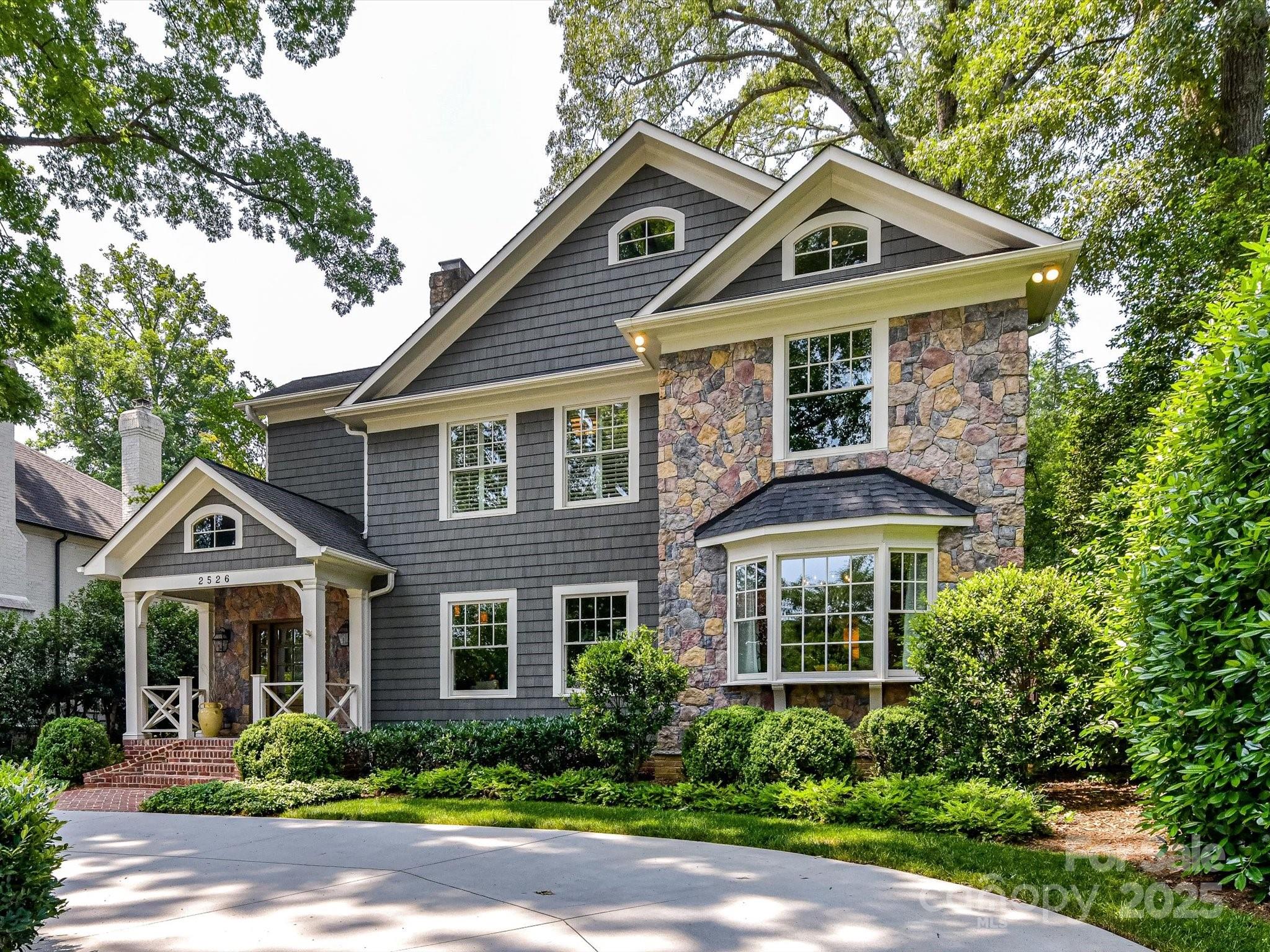 This beautifully appointed 5-bedroom home offers classic charm and modern amenities in one of Charlotte’s most coveted neighborhoods. Enjoy spacious living with elegant finishes throughout, including hardwood floors, custom millwork, and a chef’s kitchen perfect for entertaining. Step outside to a private backyard oasis featuring a sparkling pool, relaxing hot tub, and a detached 2-car garage. Ideally located near top schools, parks, and the best of Myers Park dining and shopping—this is luxury living at its finest!