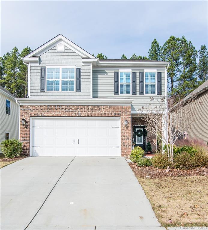 Why wait to build? This home is move-in ready! The popular Crestwood floorplan features hardwood floors on main, granite counters, plantations shutters, gas log fireplace, custom lighting, tiled bathrooms, and a fenced in yard.