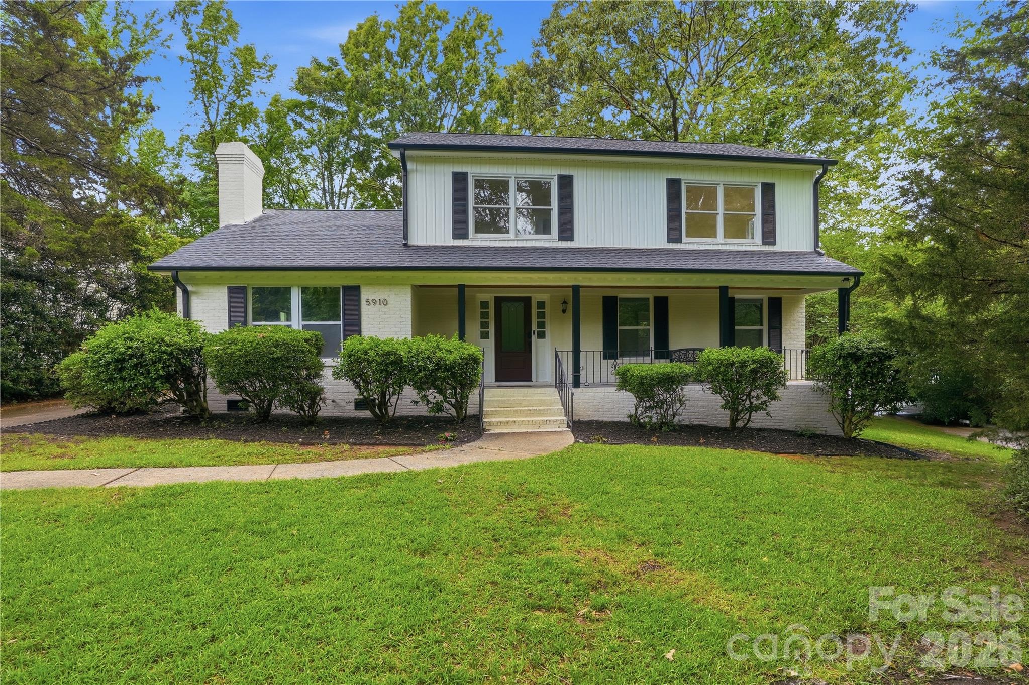 Located in the highly sought after Lincolnshire neighborhood, this beautifully updated home offers exceptional access to SouthPark, Myers Park, Freedom Park, and is within walking distance to Providence Day School. Tucked away on a private cul-de-sac lot surrounded by mature landscaping, this property combines timeless charm with today’s most sought-after upgrades.

Offering over 2,235 square feet of thoughtfully designed living space, this 4-bedroom, 2.5-bath home features an open and versatile floorplan ideal for both everyday living and effortless entertaining. The inviting interior showcases newer laminate wood flooring, fresh designer-inspired white paint accented with black hardware, recessed lighting throughout, additional custom accent walls, and built-in shelving systems in the closets for elevated organization and functionality.

The stunning renovated kitchen is the heart of the home, complete with custom cabinetry, quartz countertops, stainless steel appliances, built-in features, and a wine refrigerator. Spacious living and gathering areas provide the perfect setting for hosting family and friends.

Beautifully updated bathrooms feature designer tilework on the showers, walls, and floors, while the well-appointed laundry room offers cabinetry, sink, and quartz countertops for added convenience. A walk-in attic provides abundant storage and future expansion potential.

Step outside and enjoy your own private outdoor retreat featuring a large covered porch with stained wood ceiling and recessed lighting, expansive deck, partial privacy fencing, and a cozy outdoor fireplace perfect for year-round enjoyment. Additional recent improvements include a new HVAC system, new water heater, new roof, and gutters.

Completing the property is an oversized detached two-car garage and the added benefit of no HOA. A rare opportunity in an unbeatable location — bring your buyers and let them fall in love with their next home!