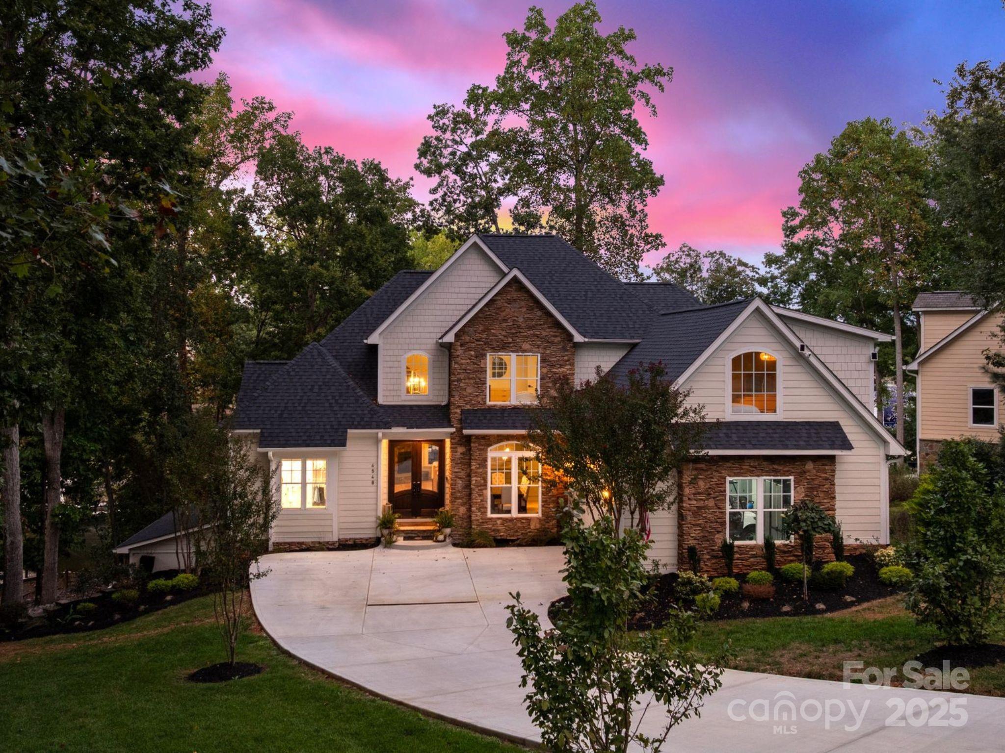 Experience the very best of Lake Norman living from this beautifully updated waterfront retreat in Denver, NC. Nestled in a quiet cove just moments from the main channel, this home captures the perfect balance of peaceful seclusion and easy lake access. Thoughtfully reimagined, it features a refreshed floor plan, a stunning new kitchen, beautifully renovated bathrooms, an expanded deck for entertaining, and a brand-new roof for lasting peace of mind. Designed for flexibility, the home offers a three bedroom septic yet lives like a five-bedroom residence with multiple spaces perfectly suited for guests, a home office, or recreation (see attached floor plans). Modern upgrades include a whole-home generator, enhanced lighting, and seamless indoor-outdoor flow designed to take full advantage of the water views.

Set along over 520 miles of scenic shoreline, Lake Norman offers an unmatched lifestyle of recreation and relaxation. Spend your mornings boating or paddleboarding from your private dock, and your evenings unwinding on the sandy beach or entertaining on the expansive deck as the sun sets over the water. Whether enjoyed as a year-round residence or a weekend escape, this home perfectly captures the beauty, comfort, and ease of true Lake Norman waterfront living.