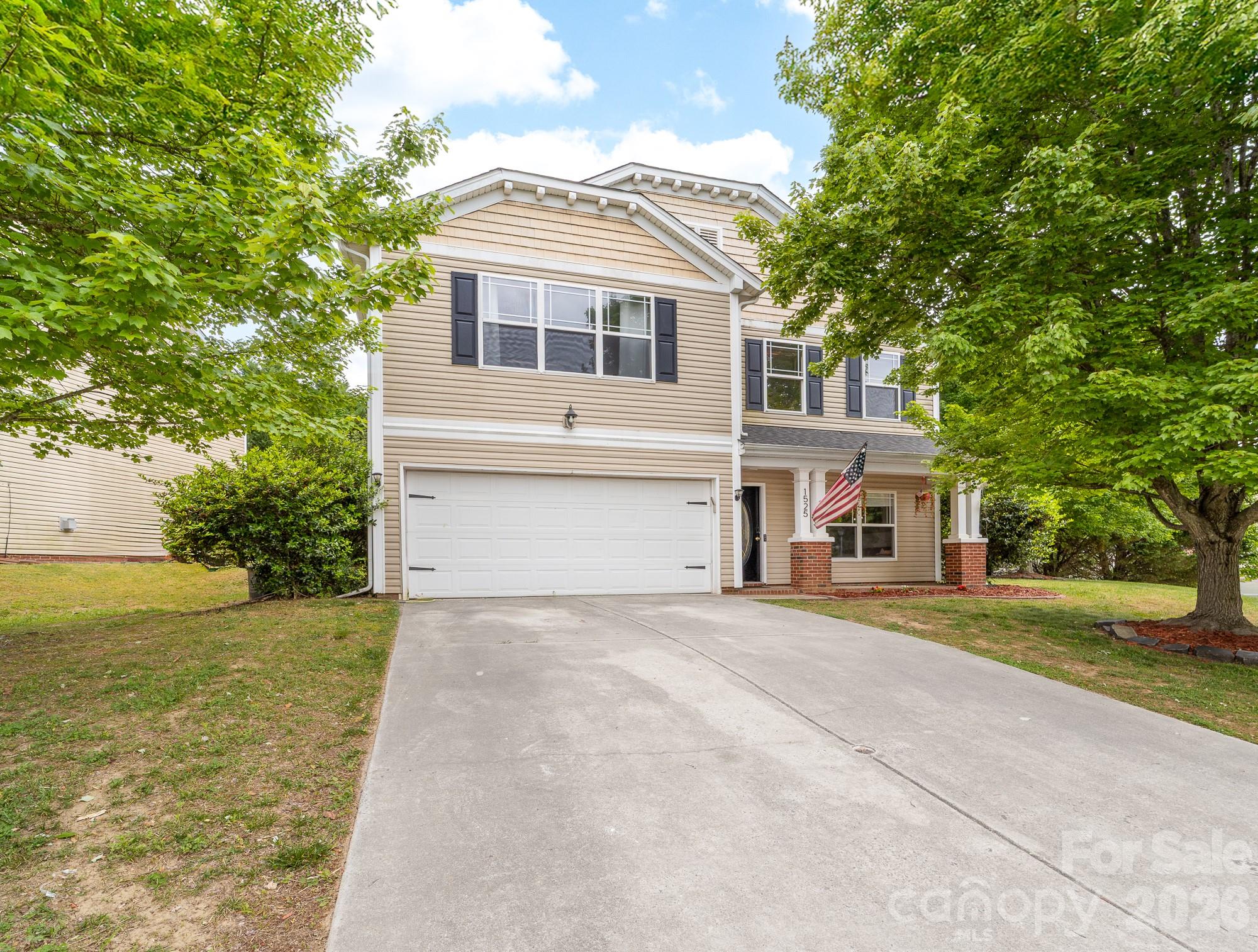 Welcome home to this beautifully upgraded 4-bedroom, 2.5-bath residence offering more than 2,700 square feet of comfortable living space! The open floor plan is perfect for entertaining, featuring a gourmet kitchen that overlooks the cozy family room with an oversized fireplace. Upstairs, you'll find a spacious primary retreat with an oversized walk-in closet and an ensuite bath complete with a relaxing garden tub and separate shower. Three additional bedrooms and a large loft provide flexible living space for everyone. Step outside to a private, tree-lined fenced backyard that's perfect for relaxing or hosting friends and family. Major updates include a new roof (2026), and a new water heater (2026). Ideally situated just minutes from shopping, restaurants, and easy access to I-85. Come see it for yourself! Showings start Saturday July 11th!