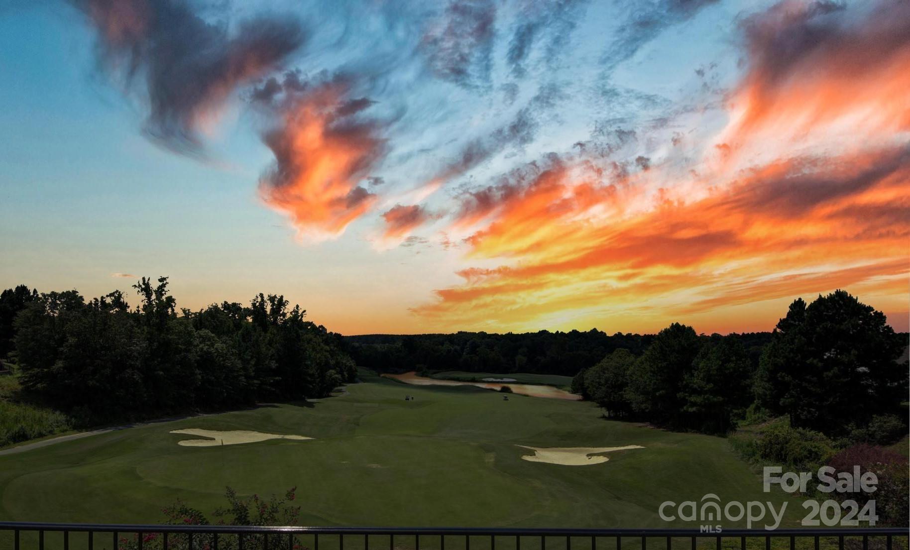 Experience unparalleled luxury in this one-of-a-kind home, nestled on a quiet cul-de-sac street atop a scenic overlook in Sun City Carolina Lakes. Boasting breathtaking panoramic views of 2 golf holes, a serene lake, & tranquil Catawba River, this home offers an unrivaled blend of privacy & elegance. The open-concept interior features a gourmet kitchen, spacious great room with cedar beams, & an owners suite with stunning views. Enjoy beautiful sunsets & year-round comfort in the 4-season room, complete w/ its own HVAC, sliding windows, & automatic shades. The lower level provides versatile space for entertainment, hobbies, storage & private guest suite & bthrm. Step outside to the covered patio & beautifully landscaped yard, where you can savor the peaceful surrounding. Other features: 2 gas HW heaters, air scrubber, pull-out shelves in all cabinets, golf cart garage bump-out, & so much more! Don’t miss this rare opportunity to own the most exclusive property in Sun City!