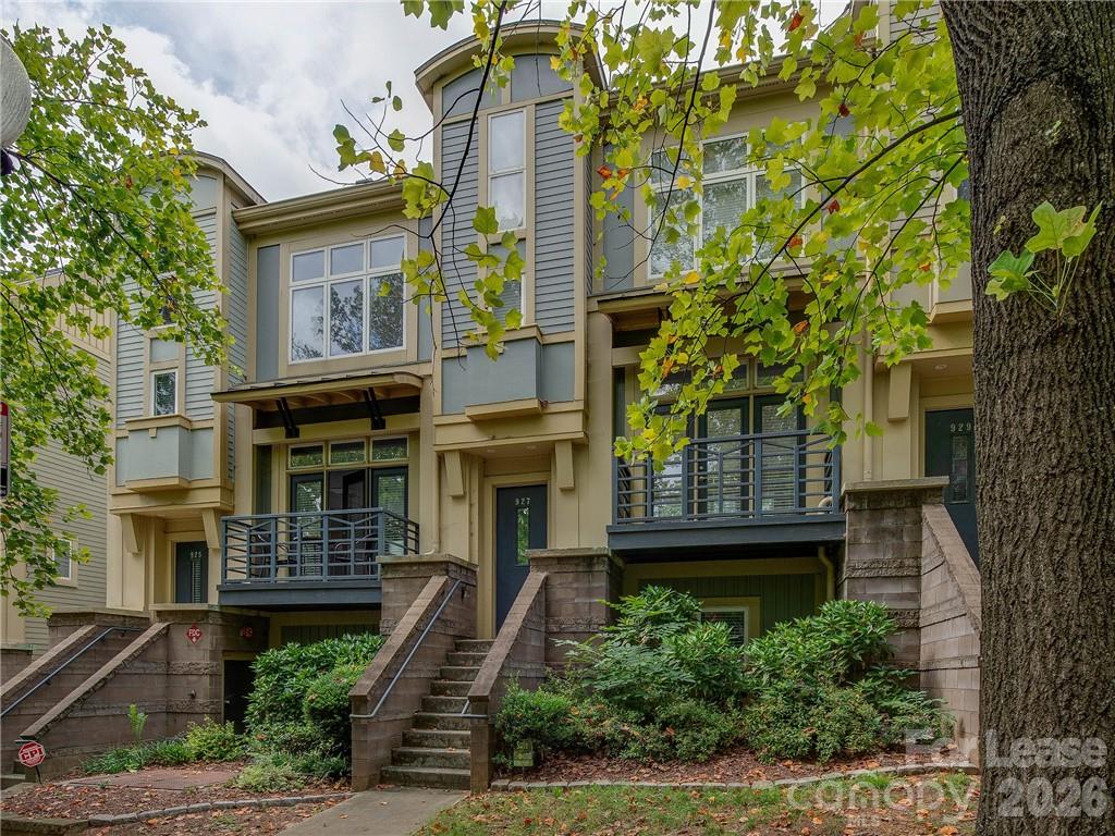 Stunning condo in Uptown's popular and pedestrian friendly First Ward with a roof top patio!  This lovely craftsman inspired home is within a few blocks of great dining, entertainment, parks, green ways, the light rail, Spectrum Center and everything Uptown has to offer.  As you walk in you are greeted by lots of natural light highlighting the large kitchen complete with island and two story great room with private balcony. Upstairs is a large lofted bedroom with modern bath and stairs leading to the amazing roof top patio.  Enjoy sunsets, stargazing, fireworks and so much more on the private terrace overlooking all of Uptown!  The lower level bedroom has its own private den, bedroom and bath as well as a courtyard! There is a private parking space and plenty of on street parking.  New paint and carpet throughout and this home is move in ready.  All appliances are included, washer/dryer too!  Take a look today!
