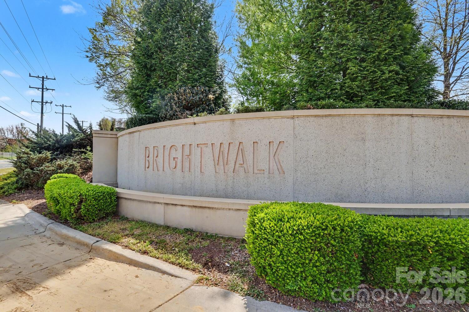 Live 6 minutes from downtown and walking distance to Camp North End. This 2021 townhome is perfect if you're looking for a home that is affordable and in a great location. Featuring 3 large bedrooms with private baths and lots of living space. If you're thinking about having a roommate, this floorplan works great. Each bedroom is on a different floor with a private bath and private living space. The main level includes an open floor plan with a large well appointed kitchen, dining area and great room. The primary suite, on the main level has great natural light and features a large walk-in closet and spacious bathroom. If you have looked at townhomes, you know that parking is always an issue. This unit has extra parking that you don't find in the majority of units. Since it's an end unit and the last unit, it has great space for parking extra cars outside of the 2 car garage. Another unique feature of this unit is the private fenced yard allowing you outside living space and room for a dog to be outside. Lastly, Brightwalk allows short term rentals. This flexibility is great for owners if they don't live here full time. It's also terrific for an investor. Don't miss out on this one!