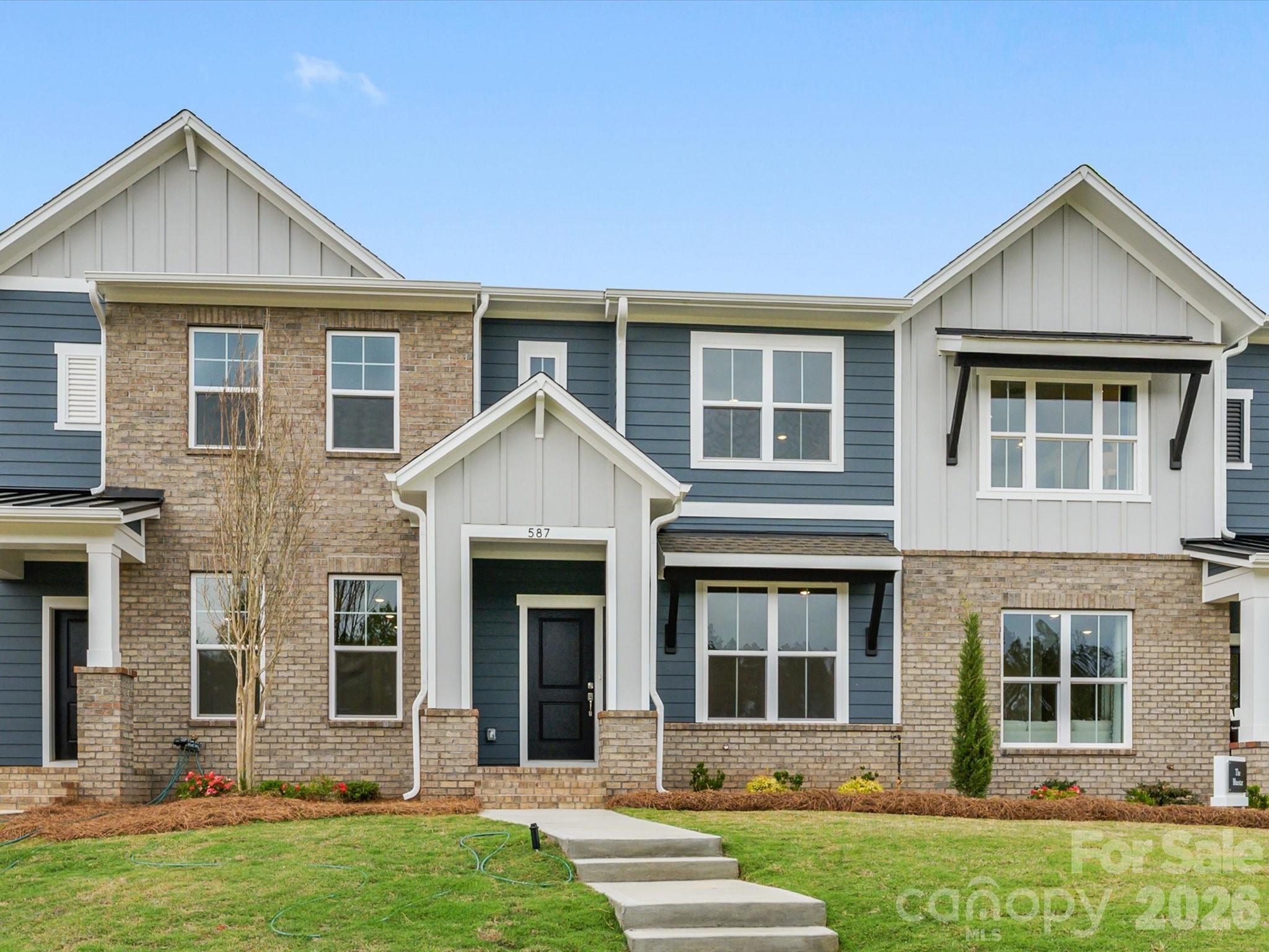This beautifully crafted new construction home offers modern style, exceptional warranties, and low-maintenance living with lawn care included, giving you more time to enjoy the comfort and convenience this community provides.

Featuring 3 bedrooms and 2.5 baths, this thoughtfully designed home delivers style and functionality throughout. The kitchen showcases 42-inch Brellin PureStyle cabinets in Frost, paired with stunning Calacatta Villa quartz countertops and a gas range—a perfect blend of clean, modern design and everyday practicality. This is not your typical cookie-cutter builder home.

Durable LVP flooring spans the entire first floor and continues up the stairs, creating a cohesive, upscale look with easy maintenance. A spacious 2-car garage provides additional storage and convenience.

Built with quality and longevity in mind, this home includes Hardie Plank siding, 2x6 advanced construction walls, and is certified under the Environments for Living® Gold Standard, offering exceptional energy efficiency, comfort, and cost savings year-round.

Ideally located near restaurants, shopping, and everyday conveniences, this home offers a truly walkable lifestyle. Even better, a new Target-anchored shopping complex is on the way—bringing even more convenience just minutes from your doorstep.

A modern, energy-efficient townhome with premium finishes and low-maintenance living—this is a home designed to stand out.