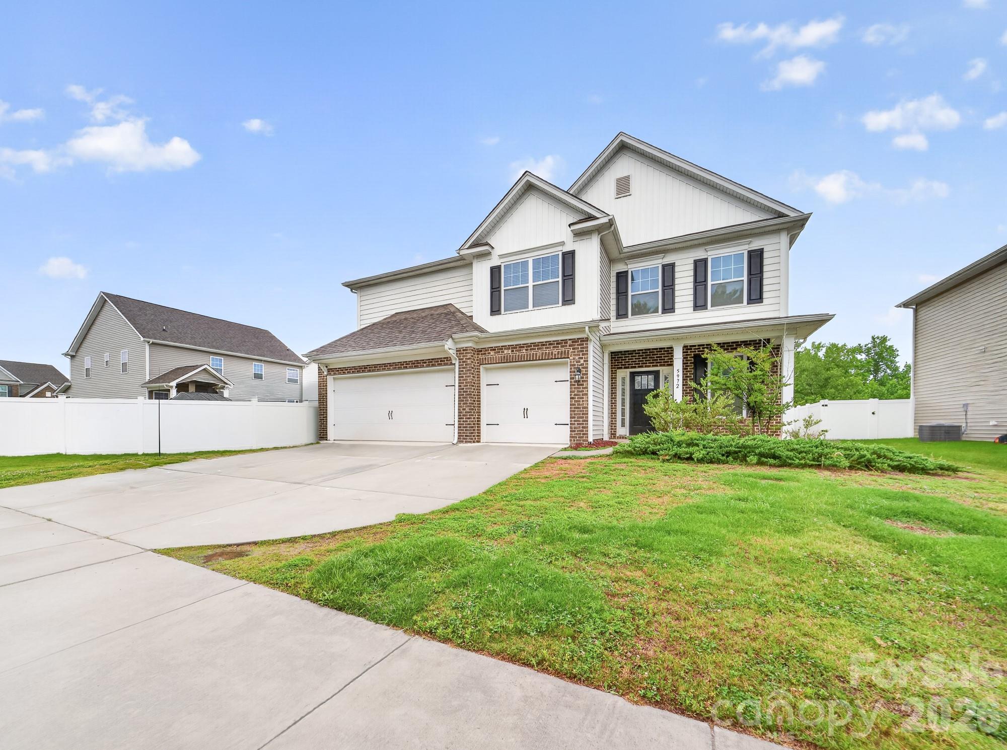 New Listing in the Austin Corner's Community in Concord! What a great location. Entering the front door, you are met with so much natural light streaming in from the 2 story living room windows. This area is large and open to the dining room which makes it perfect for entertaining. The beautiful kitchen includes a double oven and gas cook top range. The kitchen is open to the den area located on the back side of the home. A gas log fireplace is there to keep you warm on the chilly fall nights. Just an entertainer's dream. Your guest can have their privacy with a first floor bedroom and full bath. At the top of the stairs you have a spacious open area that could be used as an office, play or hangout area. This home has so much room to spread out in. The possibilities are endless. 4 additional bedrooms are located on the upper level including the primary suite. That's correct! This home has 5 bedrooms total and 4 full baths. The laundry room is conveniently located on the upper level as well. It makes doing laundry much more convenient. There is a mud room with a drop zone as you enter the home from the 3 car garage. The home has a tankless water heater and wood laminate flooring on the entire first floor living areas. Community amenities include an outdoor pool and playground which is located around the corner from this home. With over 3700 square feet, this is the perfect place to call home. Come and see for yourself.