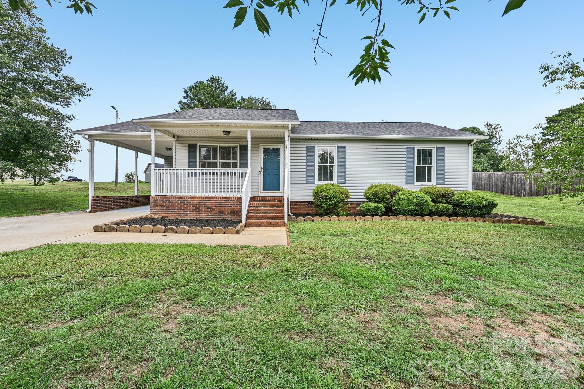 Welcome home to this charming 3-bedroom, 2-bath home on .55 acre which offers comfort, convenience, and plenty of outdoor space! This 2025 roof & 2022 hvac unit & fresh paint makes it ready to move in ready. The living room connects to the dining room providing just enough open-concept with separation, the best of both worlds. The kitchen overlooks the beautiful large backyard with firepit & oversized deck. Down the hall are all bedrooms. The primary bedroom is tucked in the corner for optimum privacy. Situated on a spacious lot, this home features a large yard that's perfect for entertaining, gardening, pets, or simply enjoying the outdoors. Two storage buildings (1 with power) offer abundant space for tools, lawn equipment, hobbies, or additional storage needs. Whether you're looking for your first home, downsizing, or adding to your investment portfolio, this property offers endless potential with the space and features you've been searching for.