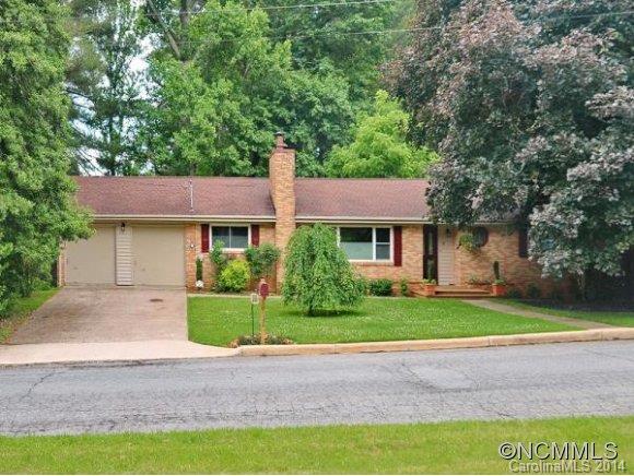 Well maintained ranch home on .91 A with newly refinished hardwood floors in living room and dining room. Remodeled kitchen features granite counters, island, cork floors and built-ins. Opens to spacious deck. Lower level with large family room, 2 bedrooms and full bath (bath just under 7', not in sq footage) perfect for guests; spacious storage areas too. Fine neighborhood with excellent amenities close by. Home warranty.