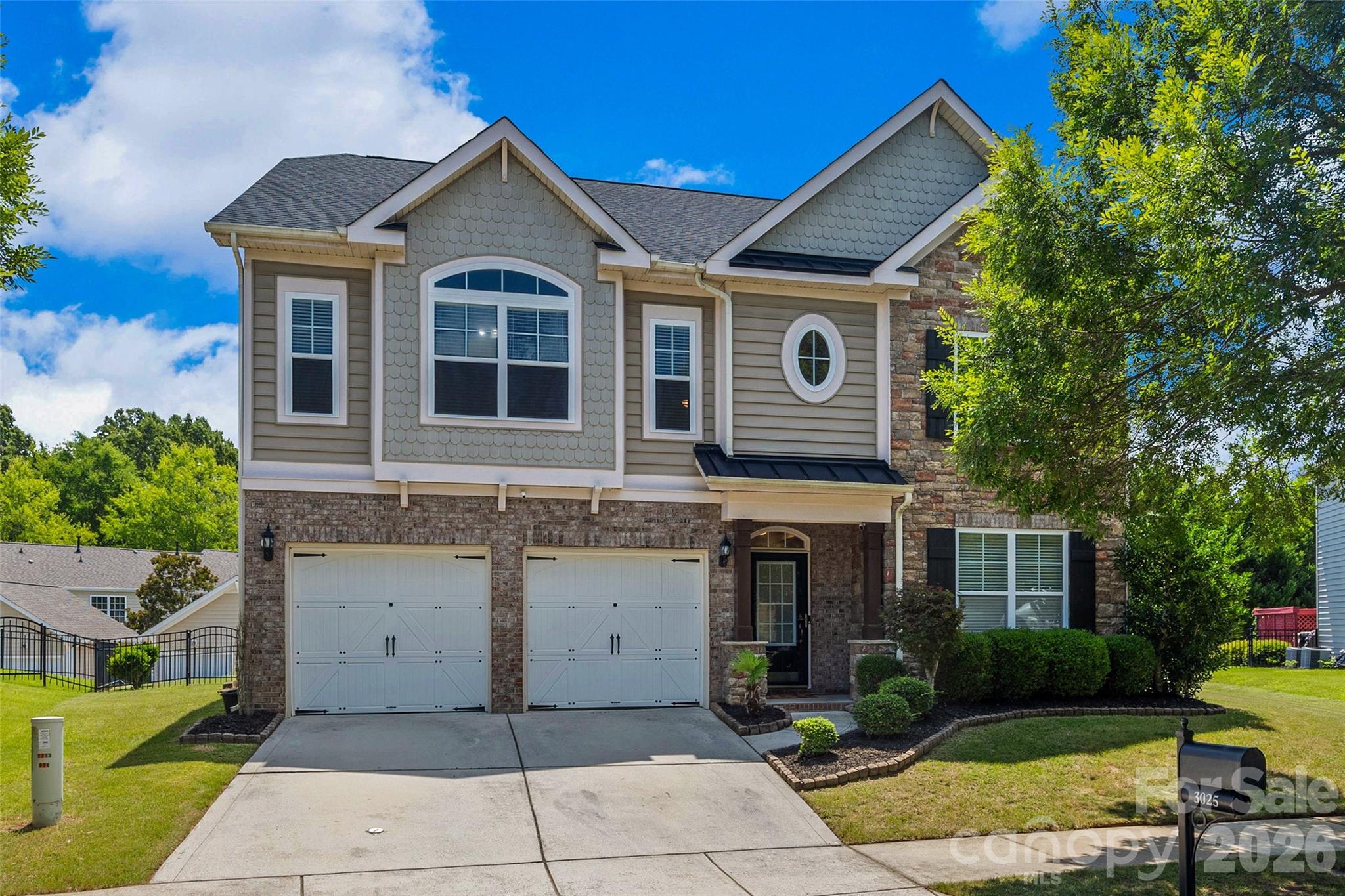 Welcome home to this beautiful residence in the highly sought-after Cureton community! From the moment you step inside, you'll be greeted by gorgeous hardwood floors, abundant natural light, and an inviting atmosphere that makes you feel right at home.

The spacious kitchen is a chef's delight, featuring granite countertops, ample cabinetry, and a large pantry that provides plenty of storage. Designed for both everyday living and entertaining, the main level offers two separate living areas and a formal dining room, creating the perfect setting for gatherings with family and friends.

A convenient main-level guest suite with a full bathroom provides the ideal space for visitors, multi-generational living, or a private home office. Upstairs, retreat to the generously sized primary suite, offering a peaceful escape at the end of the day. You'll also find a huge bonus room that can be customized to fit your lifestyle—whether as a media room, playroom, home gym, or additional living space.

Enjoy peace of mind with major updates already completed, including a new roof (2025), new water heater (2025), and new HVAC system (2025). With its thoughtful layout, generous living spaces, and numerous updates, this home offers the perfect blend of comfort, functionality, and style.

Residents of Cureton enjoy outstanding community amenities and a prime location with convenient access to shopping, dining, parks, and everyday conveniences. Don't miss your opportunity to make this exceptional home yours!