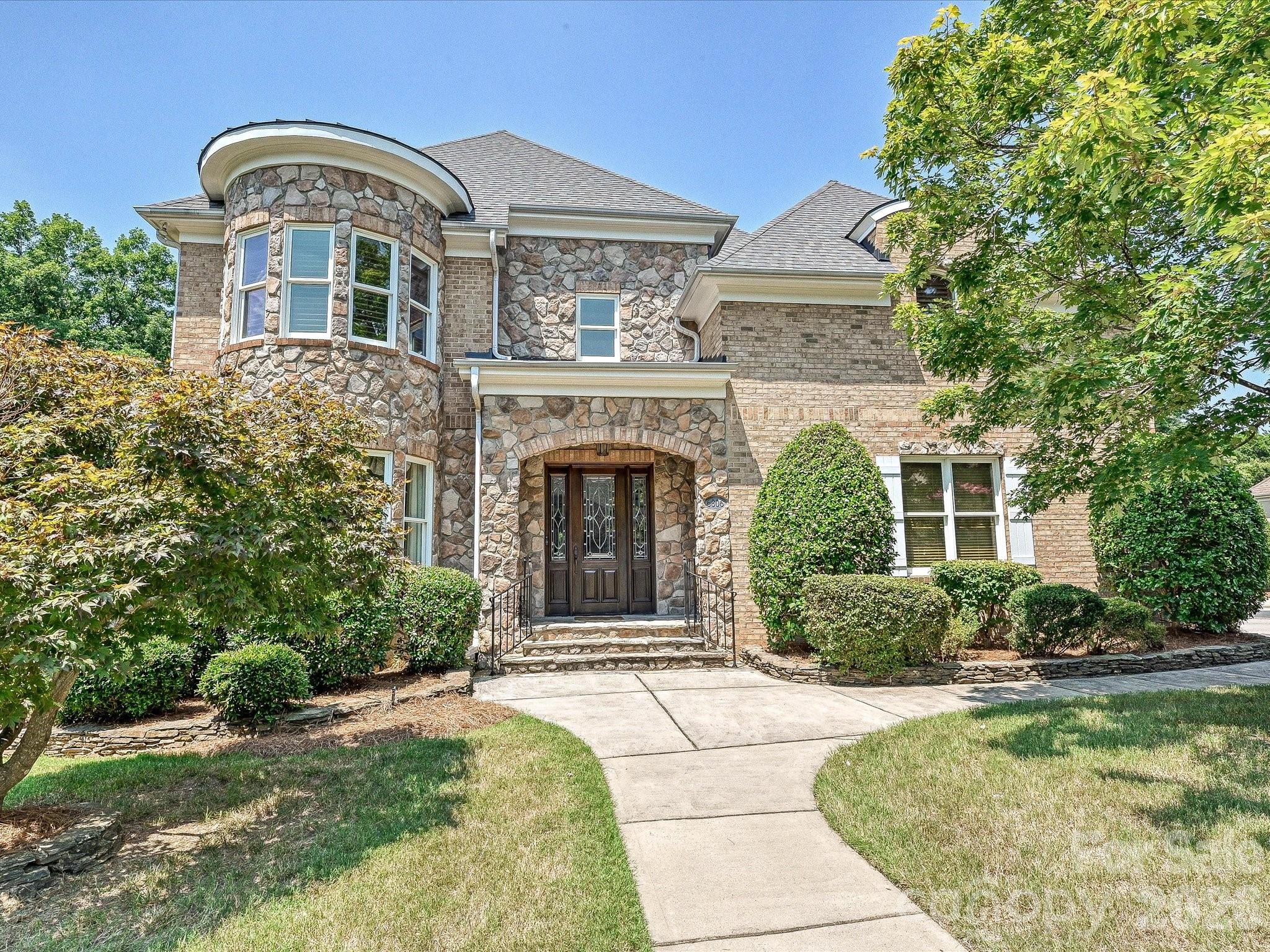 Welcome to 6806 Larrisa Court — offering over 4,000 square feet on a quiet cul-de-sac in a prime Charlotte location just minutes from Providence Road, Rea Road, and SouthPark. This spacious, well-appointed home features a warm and inviting layout ideal for both everyday living and entertaining. The kitchen is equipped with built-ins, a gas range, pantry, and a separate scullery with wine fridge — a rare and functional touch. The main level includes a generous family room with fireplace, formal dining room, private office with built-ins, laundry room with sink, and a primary suite conveniently located on the main floor. Upstairs offers multiple bedrooms plus a versatile bonus/bedroom space with two closets, providing flexibility for guests, hobbies, or additional workspace. Additional highlights include two new tankless water heaters, fresh interior paint throughout, a patio for outdoor enjoyment, pull-down attic and walk-in storage, and a 2-car garage. A beautifully maintained home with generous space and an unbeatable location — ready to welcome its next owner.