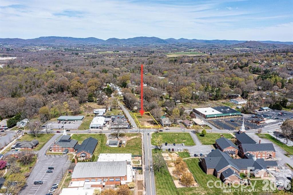 DOWNTOWN TAYLORSVILLE: Are you looking to build: TOWNHOMES, DUPLEXES, NEW CONSTRUCTION HOMES, or A Commercial Building – This level lot offers WATER + SEWER Taps in place and is zoned MULTI-USE!
.59-acre corner lot in the heart of downtown Taylorsville with MU zoning offering exceptional flexibility for townhomes, duplexes,  new construction homes, or mixed-use commercial development (Call ZONING in Alex. Co. to confirm what you want to do is allowed).
Prime walkable location near restaurants, shops, library, coffee shop, parks, and downtown amenities. One block from Hwy 16 and approx. 1 mile from Hwy 64/90 for easy regional access.
Property is level, cleared, and development-ready Prior home has been demolished and site has been graded and cleared, saving significant upfront costs.
MU zoning allows a wide range of uses including residential, rental, and potential commercial. 
Excellent opportunity for builders, investors, or developers in a growing downtown area. This lot fronts WEST MAIN AVE. & 7th St. NW. (ADDRESS: 24 7th ST. NW Taylorsville).  *Older home was taken down and removed with the power/water/sewer all left in place as they were.