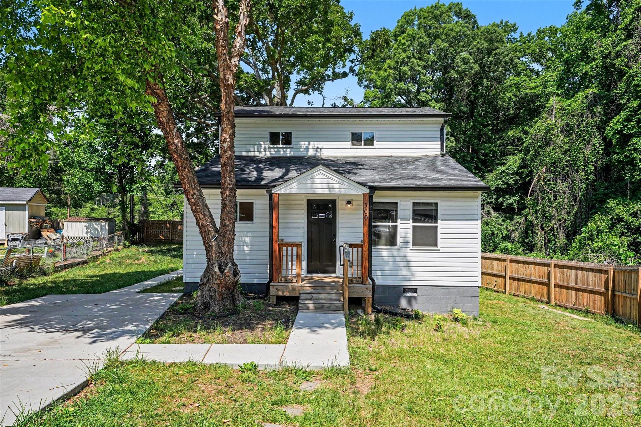 ***$5,000 Lender Credit when you get approved with participating lender*** Welcome to Mooresville! This well-maintained, low-maintenance home is an excellent opportunity for first-time buyers, downsizers, or investors looking to expand their rental portfolio. Ideally located just minutes from downtown Mooresville, Mitchell Community College, shopping, dining, entertainment, and everyday conveniences, this home offers both comfort and convenience.

Situated at the end of a quiet cul-de-sac, the property provides a peaceful setting with great curb appeal. Exterior features include a concrete parking pad, white vinyl siding, mature shade trees, a partially fenced yard, a spacious back deck, and a level backyard—perfect for relaxing or entertaining.

Inside, the home is filled with abundant natural light and has been recently renovated, making it truly move-in ready. The main level features a spacious living room, a primary bedroom, two full bathrooms, and a galley-style kitchen. The kitchen is equipped with white cabinetry, granite countertops, stainless steel appliances, a window over the sink, and a convenient laundry area.

Upstairs, you’ll find two generously sized secondary bedrooms, with a full bathroom conveniently located at the base of the staircase. Throughout the home, you’ll appreciate modern fixtures, fresh paint, and durable LVP flooring. Several major updates have already been completed, adding even more value and peace of mind.

Don’t miss the chance to make this charming home your own—schedule your showing today!