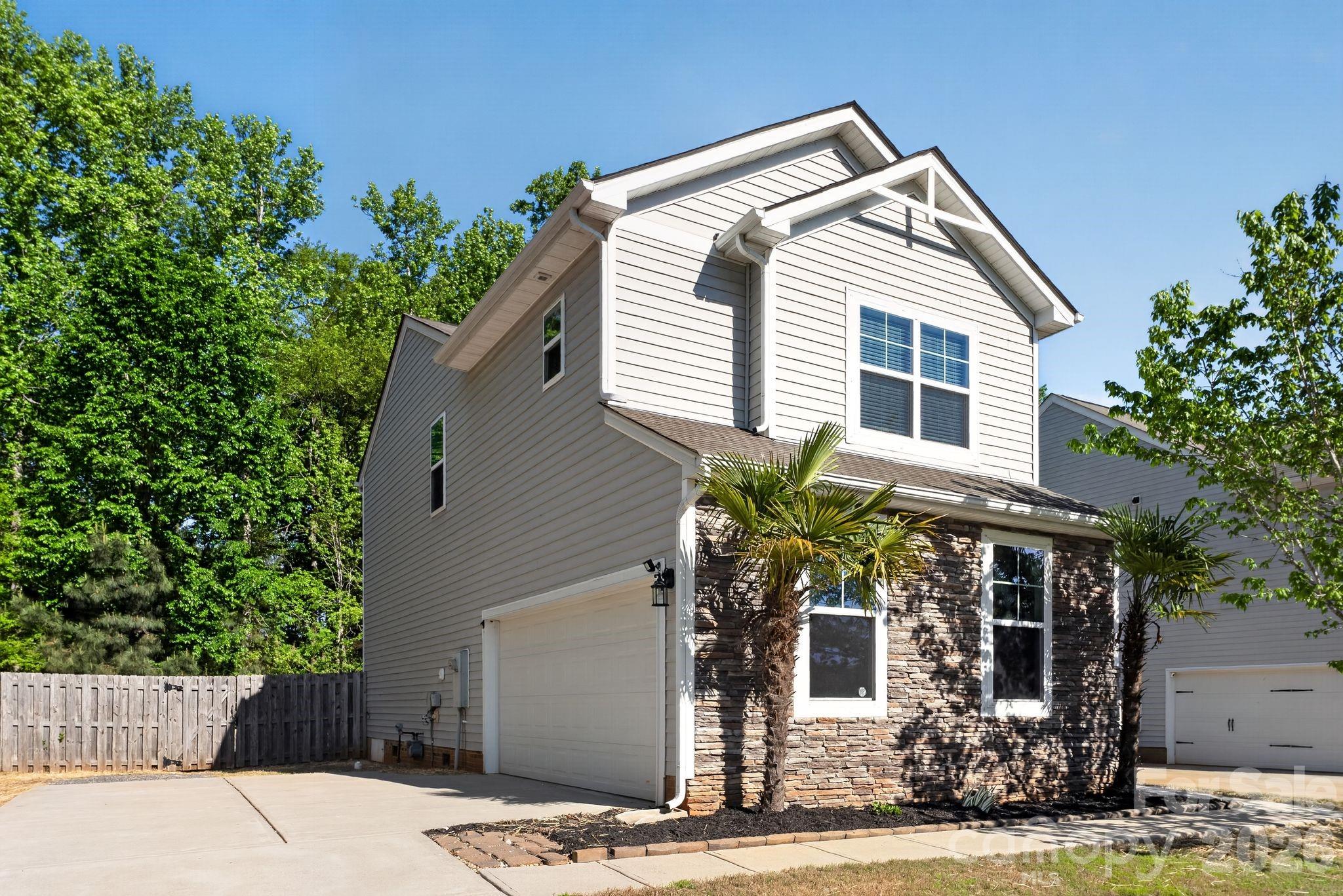 Well-maintained and thoughtfully updated 3-bedroom, 2.5-bath home offering a comfortable and functional layout. Fresh interior paint and new carpet create a clean, move-in-ready feel, while the kitchen is enhanced with a new range and dishwasher for added convenience. The main living areas feature an open flow with abundant natural light, ideal for both everyday living and entertaining. Upstairs, spacious bedrooms provide flexibility and privacy, including a primary suite with ample room to unwind. A private backyard adds to the home’s livability, offering space to relax or entertain outdoors.