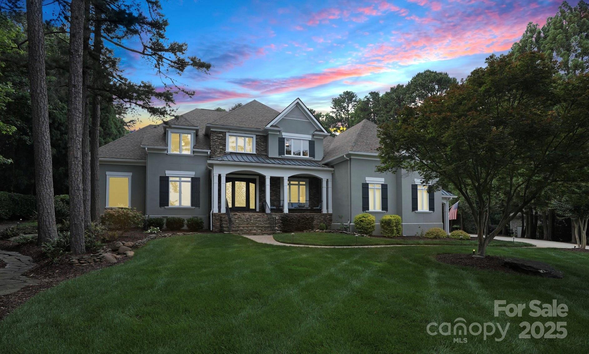 Nestled on 1.21 acres in The Point between holes 6 & 7 on TNGC! Over 5,400 sq ft of elegant living full of modern upgrades and design. Main floor hosts an office, formal dining room, family room, laundry room, & a keeping room with gas fireplace & bar area w/beverage fridge. A chef’s kitchen features a large island with bar seating, commercial gas range & oven, prep sink, & window seat w/storage. Main-level primary suite offers spa-like bath, his/her closets, walk-in shower, garden tub & deck access. Upstairs boasts three ensuite bedrooms, 2nd laundry room, game room, bonus/bedroom & abundant attic access & storage. Enjoy front porch views of the 7th hole & Lake Norman & back veranda views of the 6th fairway. This home's key highlight is the resort-style outdoor retreat with heated saltwater pool, spa & waterfall, built-in grilling station, covered Trex deck, fenced backyard & a spacious 3-car garage. A luxury sanctuary for entertaining & daily living!