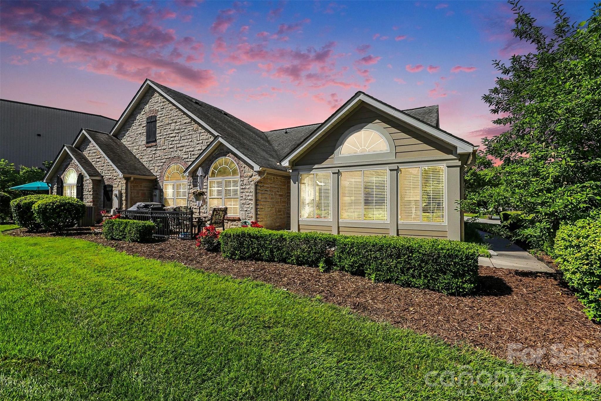 Welcome to Polo Club at Mountain Island Lake! This move-in-ready one-story patio home offers easy, low-maintenance living. The spacious primary suite features a large walk-in closet and an updated bath with dual vanities and a walk-in shower. A secondary bedroom and full bath provide comfortable accommodations for guests.
Enjoy abundant natural light in the sunroom, plus a versatile study/flex space perfect for a home office, hobby room, or reading retreat. The kitchen features ample cabinetry, under-cabinet lighting, and a convenient butler’s pantry. Updated hardwood flooring throughout the main living areas adds warmth and style.

Relax and enjoy the peaceful pond views from the front of the home, creating a serene setting. Community amenities include a pool, fitness center, and clubhouse. Conveniently located near shopping, dining, I-85, and I-485, this home offers the perfect combination of comfort, convenience, and carefree living.