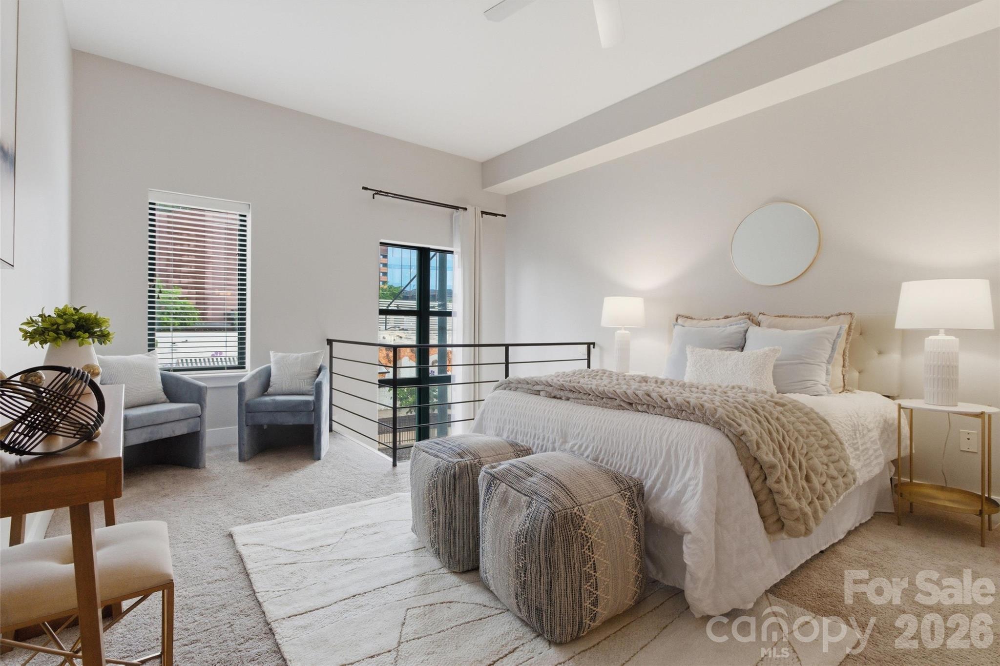 Discover city living at its finest in the heart of South End, one of Charlotte’s most vibrant and desirable neighborhoods. Just outside your door, you’ll find some of the city’s most popular restaurants, breweries, coffee shops, boutiques, and the ever-popular Rail Trail. Inside, floor-to-ceiling windows fill this modern, stylish condo with an abundance of natural light, while tall ceilings create an open, airy feel throughout. Upstairs offers an expansive primary suite with a versatile loft space that can serve as a home office, gym, or cozy sitting room. Enjoy the community rooftop terrace with stunning panoramic views of the Charlotte skyline, the perfect spot to relax or entertain friends. This condo offers the perfect blend of urban living, whether it’s weekend brunch, happy hour, working Uptown, or catching a Panthers game, it’s all right outside your door!