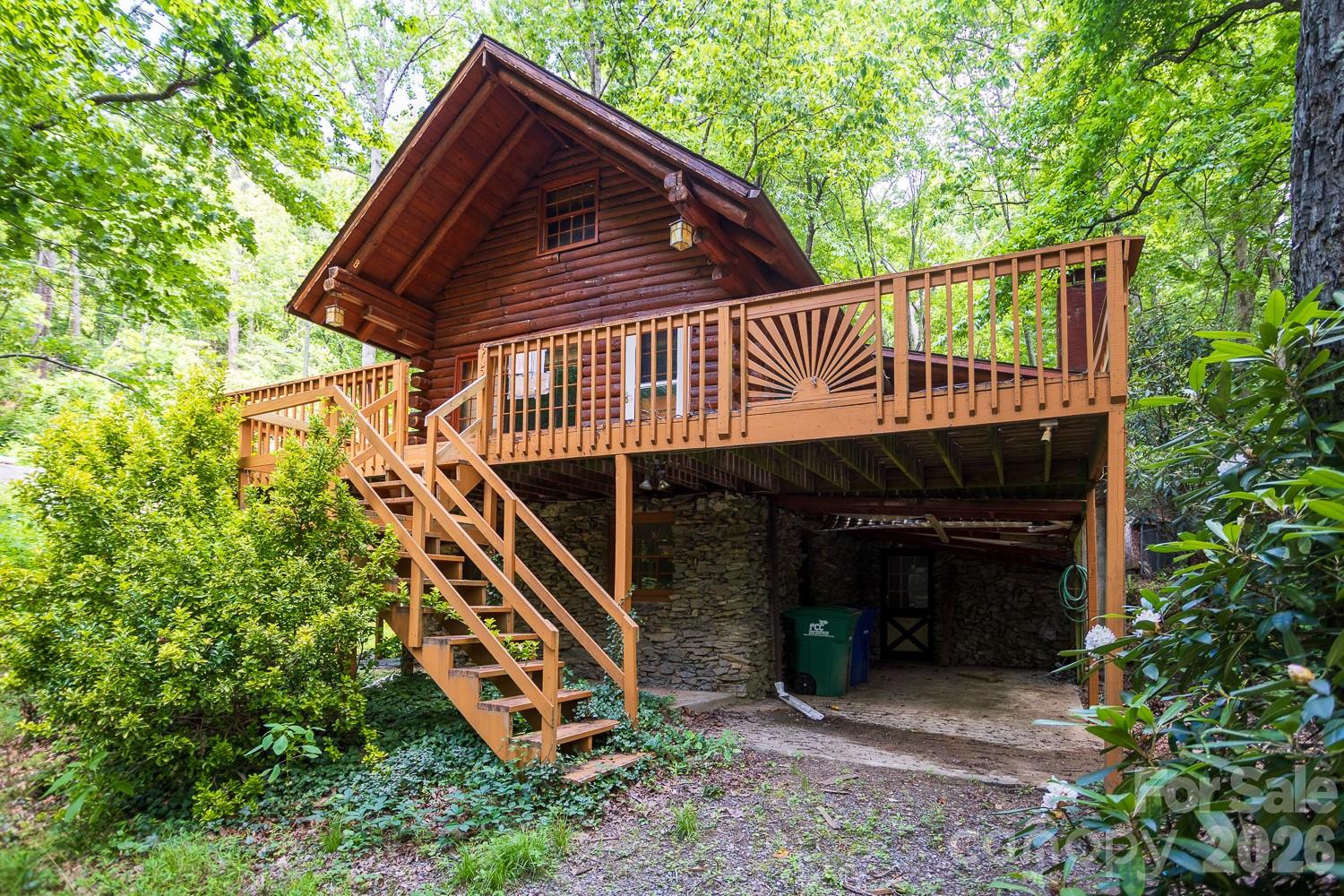Black Mountain restoration opportunity on approximately 1.28 acres. Rustic cabin-style home with mountain character, privacy, and upside for the right buyer. Seller has completed some initial repairs, but additional work is needed due to storm-related damage. Sold as-is. Ideal for experienced renovators looking for a project with long-term potential in a desirable location.

This property is best for investors, contractors, or buyers with renovation experience who see value in a home with strong mountain character and long-term potential. If you know how to evaluate a project, manage a rehab, and unlock upside in a desirable Black Mountain setting, this one is worth a serious look, especially if you like log cabins!