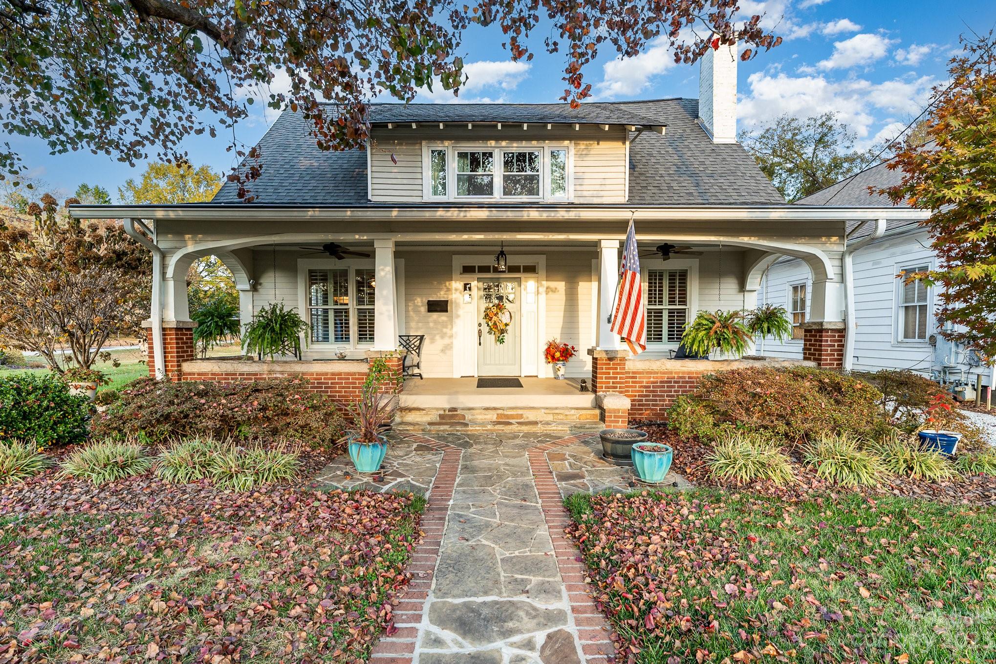 *PRICE DECREASE  Welcome to this exquisite Craftsman-style home, where timeless elegance meets modern convenience.  This home features a sprawling great room adorned with soaring ceilings, bathed in natural light and connected to an open kitchen—an entertainer's dream. The heart of the home boasts cherry kitchen cabinets, complemented by Verde Butterfly granite counters with warm brazilian cherry and oak wood floors, plantation shutters and plenty of storage. This home has been meticulously updated and lovingly cared for, with major renovations in 2008, great room/kitchen addition, tankless water heater, hardiboard siding, updated plumbing, electrical, windows, and HVAC in 2008/2018. And as the evenings turn chilly, the great room's wood stove fills the home with cozy warmth!  Don't miss the chance to make this updated Craftsman-style gem your own. *2ND floor ceiling height is less than 7 feet.