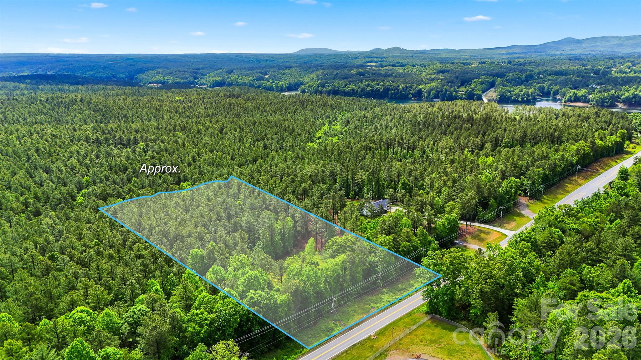 Wonderful 7.19-acre parcel with a great lay of land, excellent road frontage on Connelly Springs Road, and just half a mile from the community boat dock at Castle Bridge. Enjoy close proximity to Lake Rhodhiss, offering approximately 90 miles of shoreline for fishing, kayaking, boating, water skiing, and family fun. Conveniently located near shopping and schools, with a quick drive to Lenoir, Morganton, and Hickory, approximately 30 minutes to the Blue Ridge Parkway, and about one hour to Charlotte Douglas International Airport.

Currently zoned residential. Buyer to contact the county regarding setbacks. Gas line is available across the street. Well is needed, and the property will need to be perked for septic. No HOA, yet still enjoy Lake Rhodhiss through the community boat dock. Cable available, with the possibility of future water line access. Future construction plans include the new Castle Bridge and possible widening of Connelly Springs Road. New survey available. Great location, great price, and a wonderful opportunity to build your dream home.