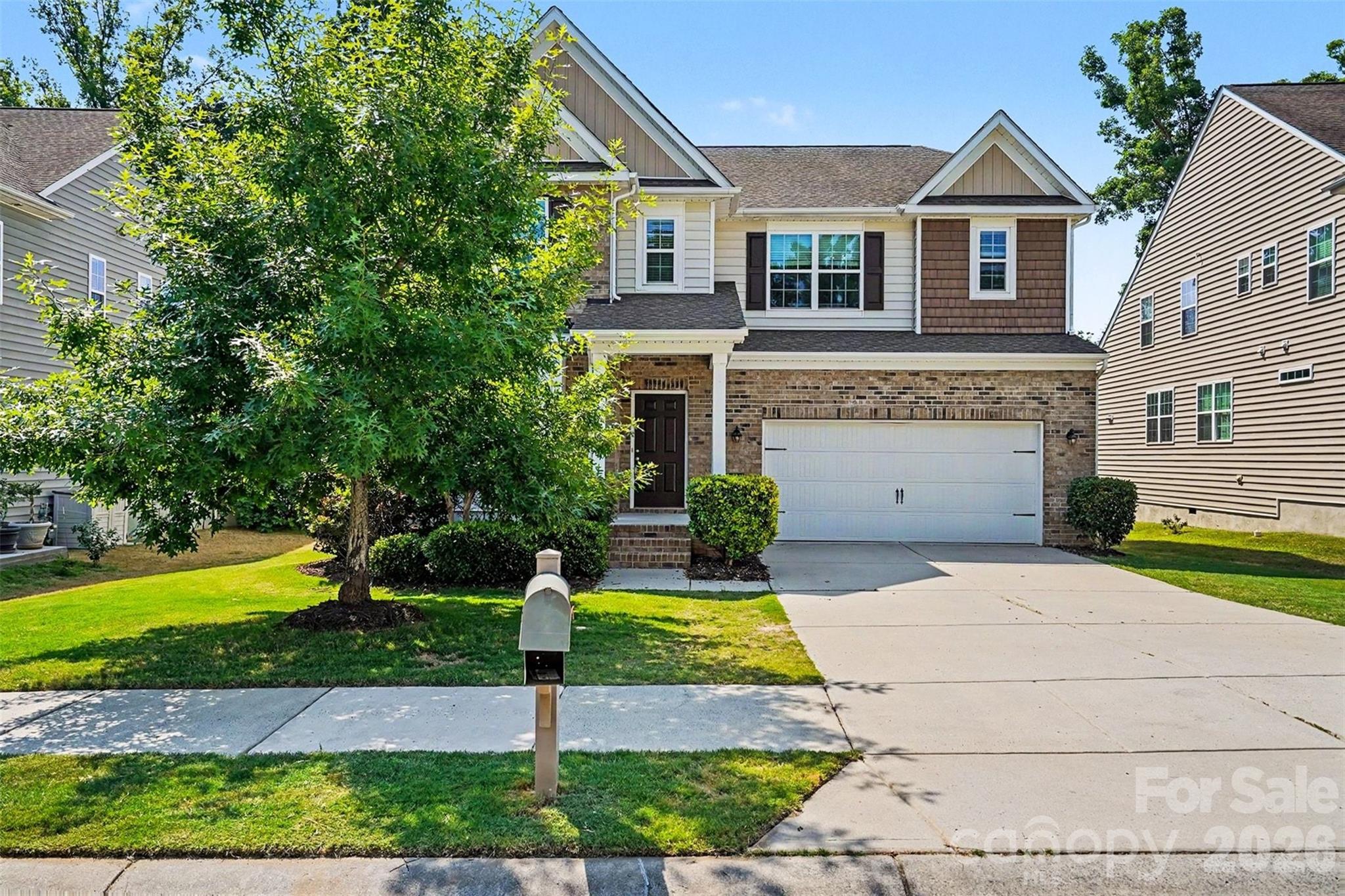 Welcome Home to 3016 Sewee Lane! Nestled in the highly desirable, resort-style Lawson subdivision, this stunning 2-story transitional home offers the perfect blend of modern comfort and timeless style. Boasting 5 spacious bedrooms and 4.1 bathrooms across 3,365 square feet of meticulously maintained living space, there is room for everyone to spread out and thrive. Step inside to find a bright and functional main level that includes an open-concept family room with a cozy fireplace, a formal dining room perfect for entertaining, a dedicated private office, and a convenient main-level bedroom with a full bath, ideal for guests or multi-generational living. The heart of the home features a beautiful kitchen equipped with an island, a modern tile backsplash, and ample cabinetry. Upgraded luxury vinyl plank throughout main level except for the In-Law Suite. Upstairs, the expansive primary suite serves as a true retreat. It is accompanied by three additional well-appointed bedrooms with oversized closets, a versatile loft space, and a conveniently located upper-level laundry room. Outside, enjoy morning coffee on your welcoming front porch or fire up the grill on the spacious back deck overlooking a private, fully fenced backyard. The Lawson Community boasts top-tier amenities just a short distance from your front door including massive clubhouse & state-of-the-art fitness center, resort-style outdoor pools (including a splash/slide park), tennis courts & playground as well as extensive scenic walking trails. Superbly located in Waxhaw with low Union County taxes and assigned to highly rated schools, including Cuthbertson High School. Don’t miss your chance to own this gorgeous slice of North Carolina living!