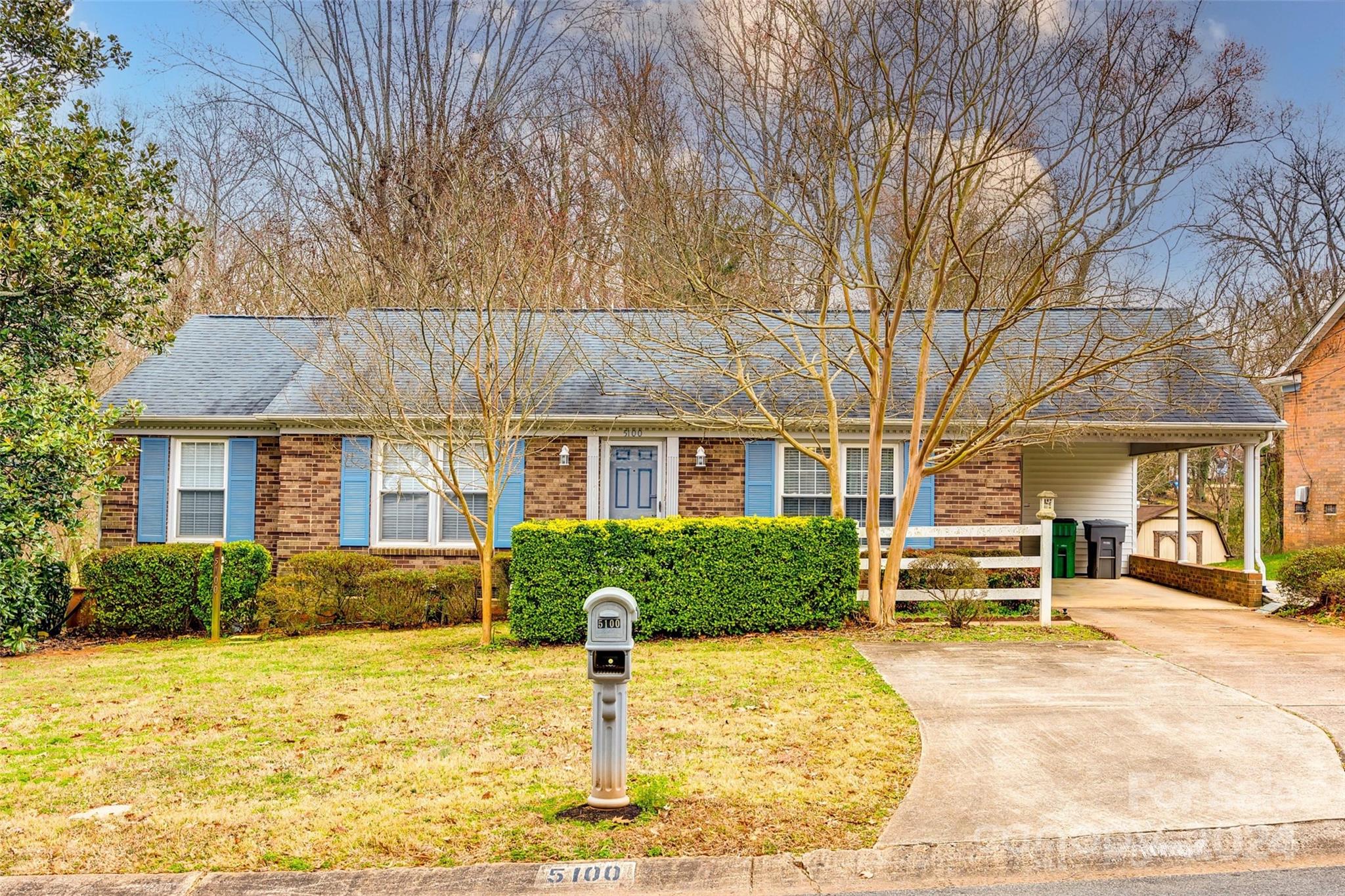 Step into this 1969 ranch style retreat where vintage charm meets modern comfort. The classic floor plan invites natural light, highlighting the original details such as the golden hardwood floors. The kitchen, a blend of nostalgia and functionality, boasts classic appliances and cabinets crafted by carpenters of yesteryear. With three bedrooms, two full bathrooms, and a serene backyard viewable from the rear covered area of the deck, this home offers a perfect balance of retro aesthetics with cozy Charlotte living. It's ideal for those seeking a timeless haven with a touch of mid-century allure so schedule a showing today!