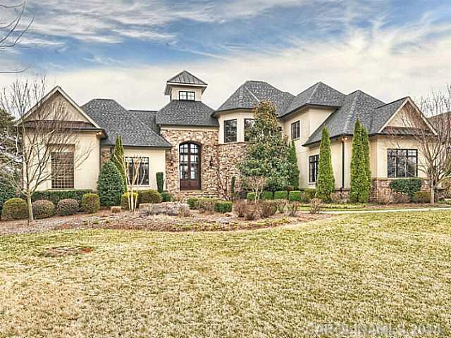 8071 sq. ft,/2 pools plus spa,/gas outdoor fire pit/Fantastic WF! Definitely a "Cooks Kitchen"! Intregrated Home Theater and Home Technology System. Lake level has huge bar with pool/gamenarea/Theater  with Concession Bar plus rec rm w/natural stone FP. Wine Cellar,gas grills on LL & Main. Spa cascades to small "dipping pool" plus separate large pool w/ water feature & Swim jet.. DON'T MISS THIS!